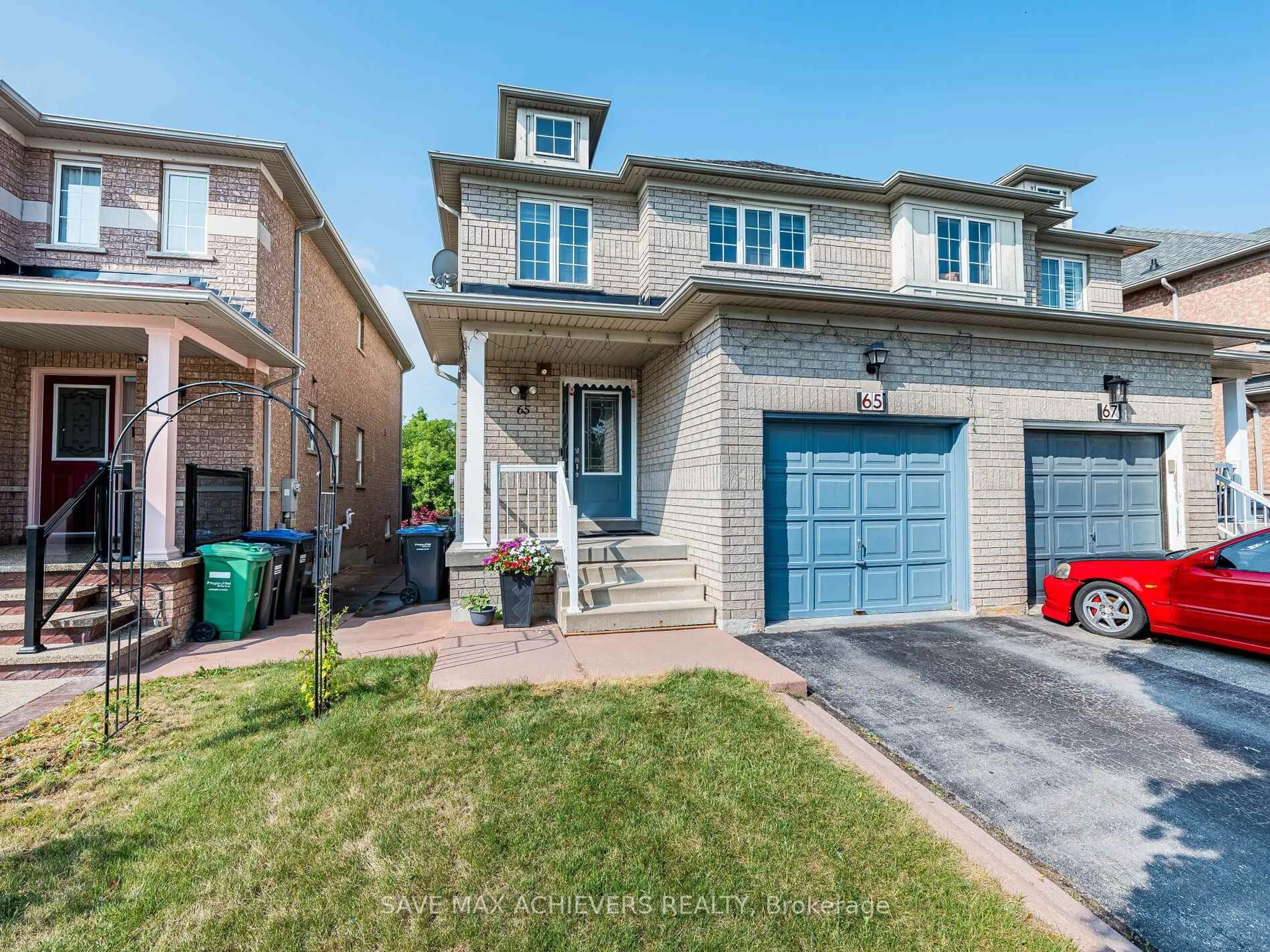 Home with brick exterior material, street for 65 Eastview Gate, Brampton Ontario L6P 1N5