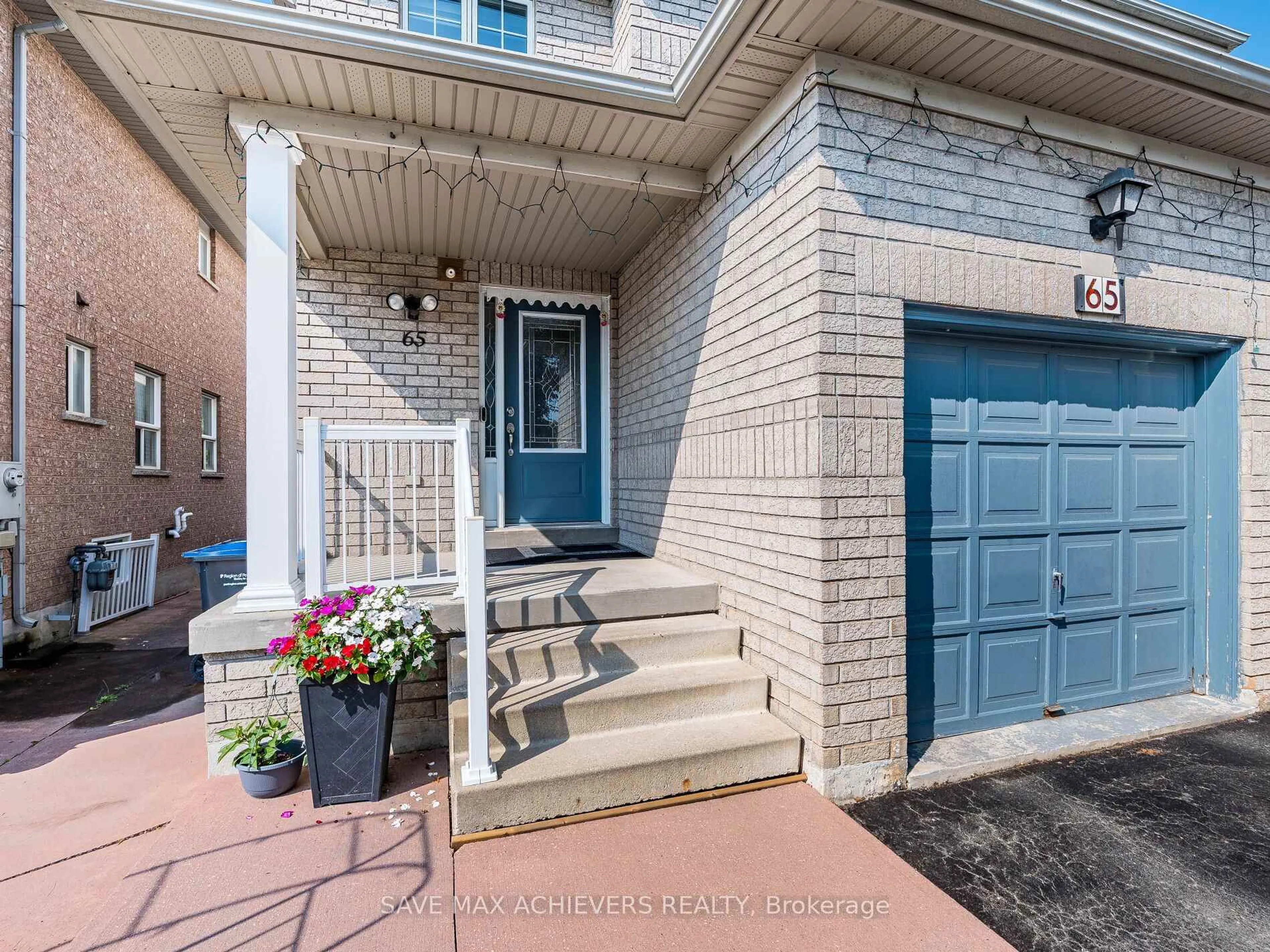 Home with brick exterior material, street for 65 Eastview Gate, Brampton Ontario L6P 1N5