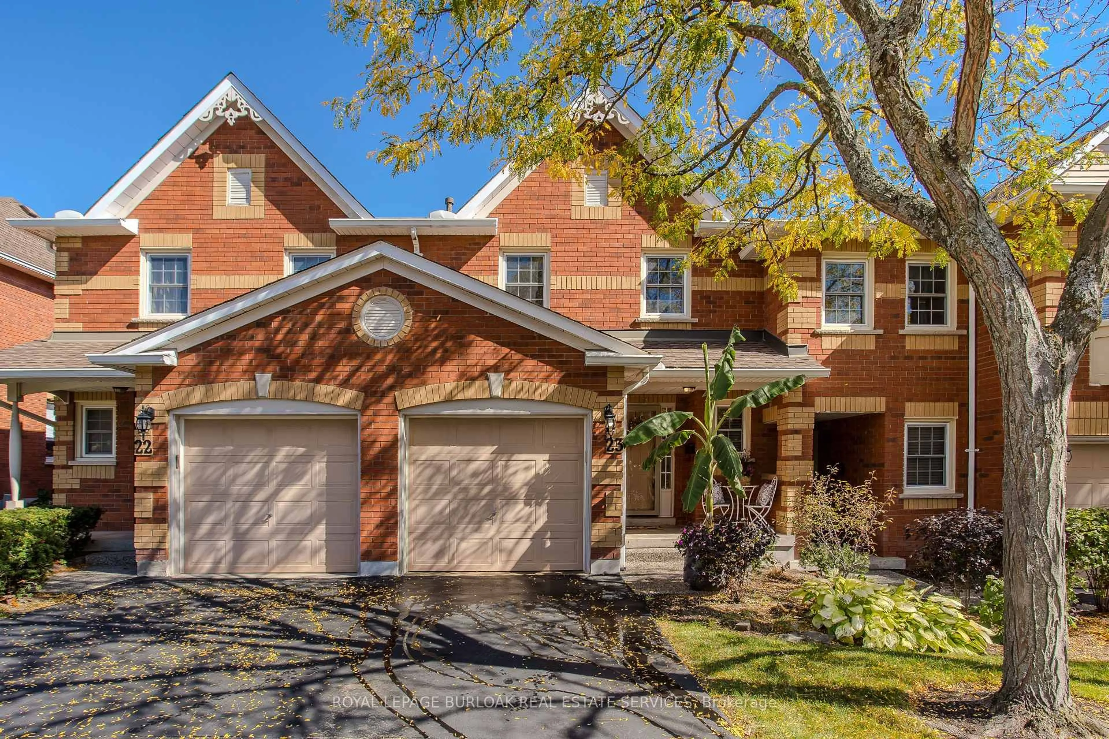 Home with brick exterior material, street for 1415 Hazelton Blvd #23, Burlington Ontario L7P 4W6