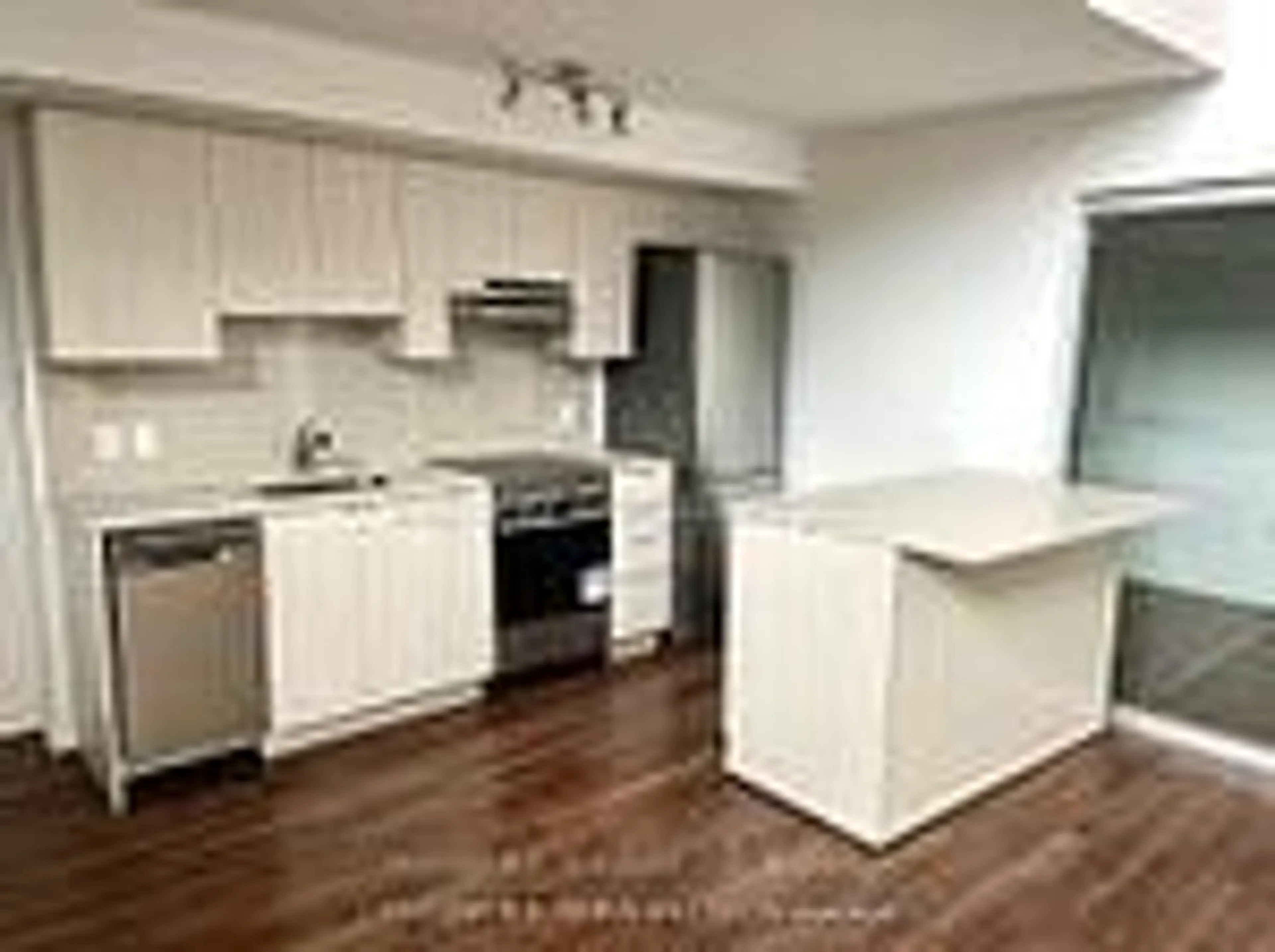 Standard kitchen, wood/laminate floor for 497 Horner Ave #2, Toronto Ontario M8Z 0C2