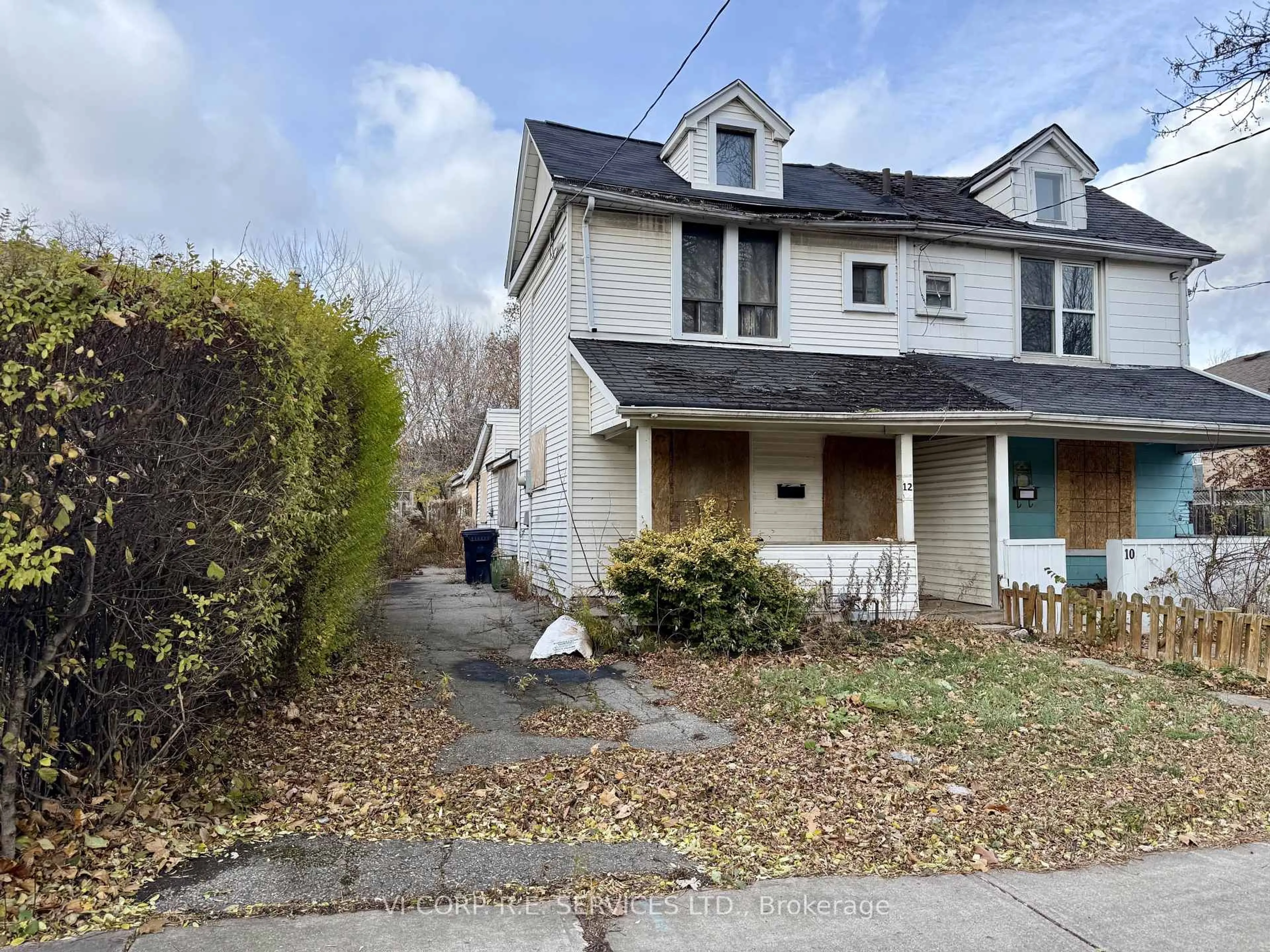 Home with vinyl exterior material, street for 12 Cavell Ave, Toronto Ontario M8V 1P2