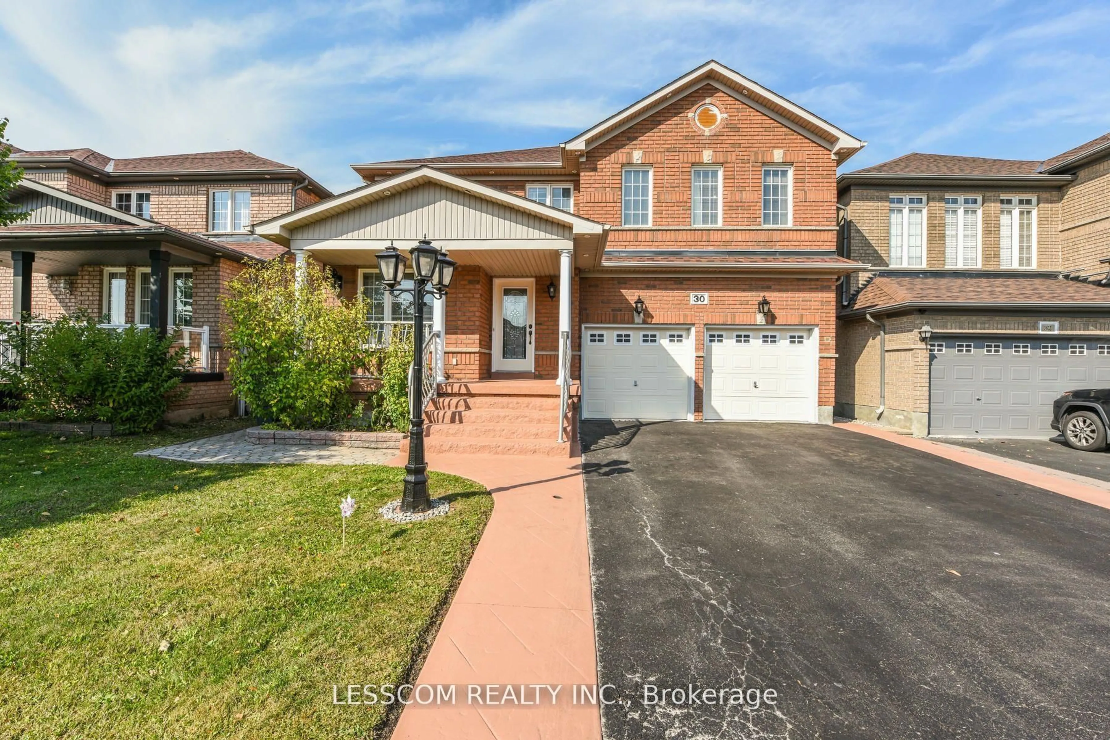 Home with brick exterior material, street for 30 Fairhill Ave, Brampton Ontario L7A 2E7
