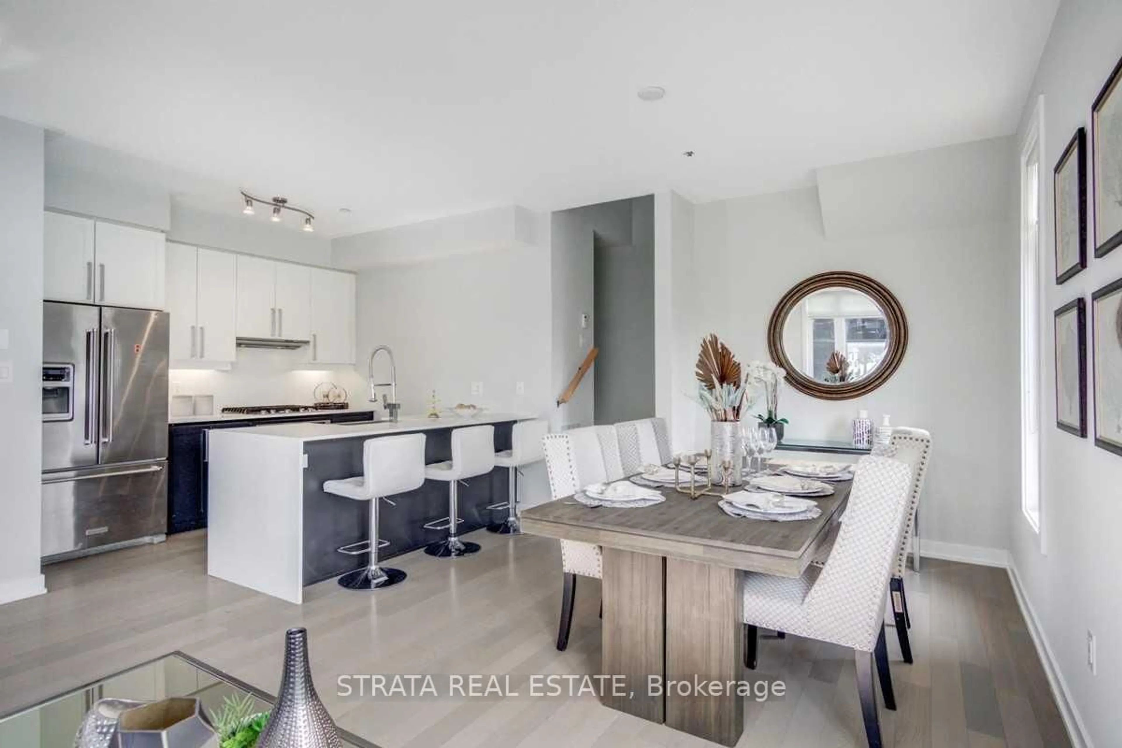 Open concept kitchen, ceramic/tile floor for 4070 Parkside Village Dr #Th 12, Mississauga Ontario L5B 0K2