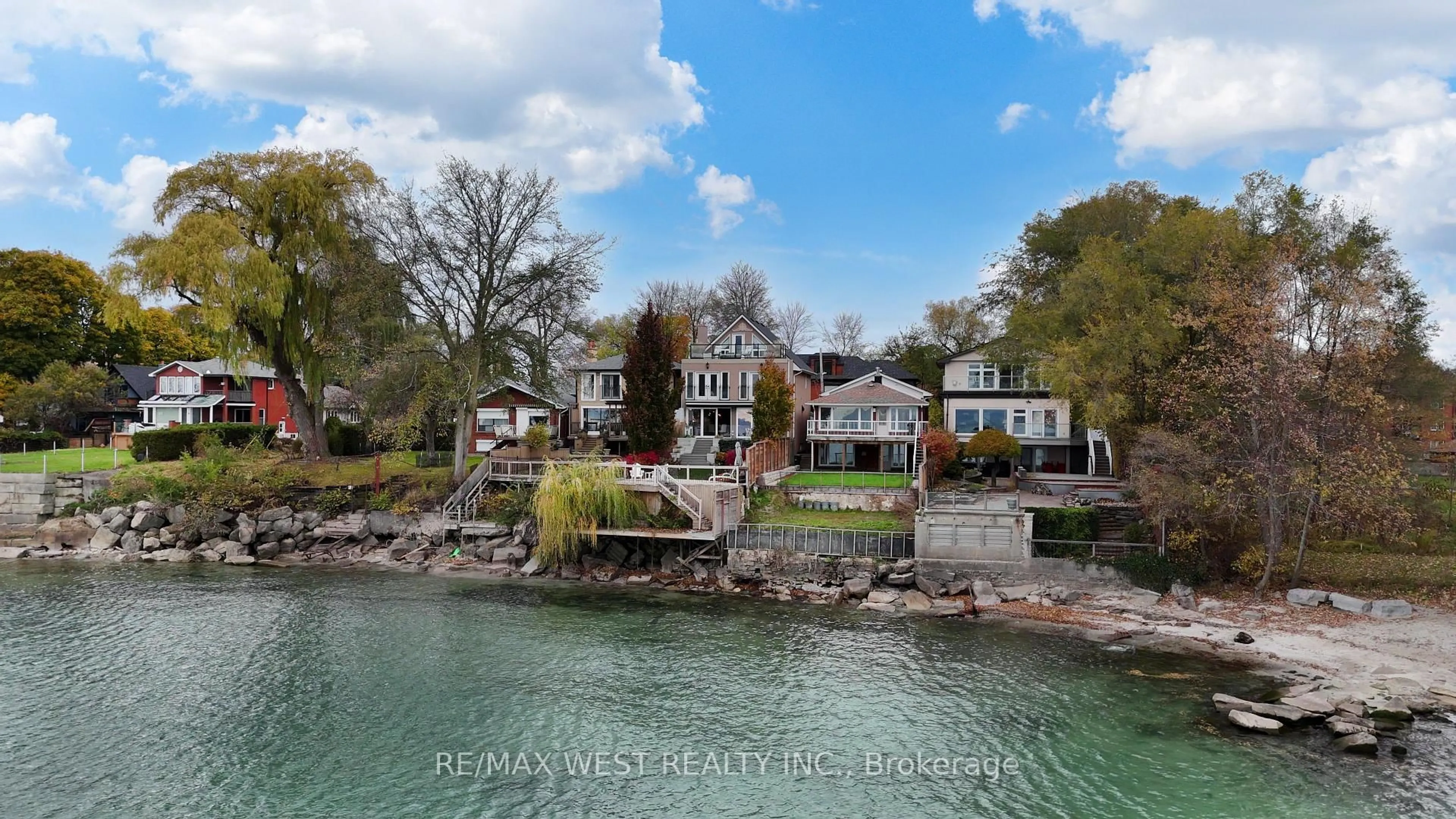 A pic from outside/outdoor area/front of a property/back of a property/a pic from drone, water/lake/river/ocean view for 5 Eleventh St, Toronto Ontario M8V 2G2