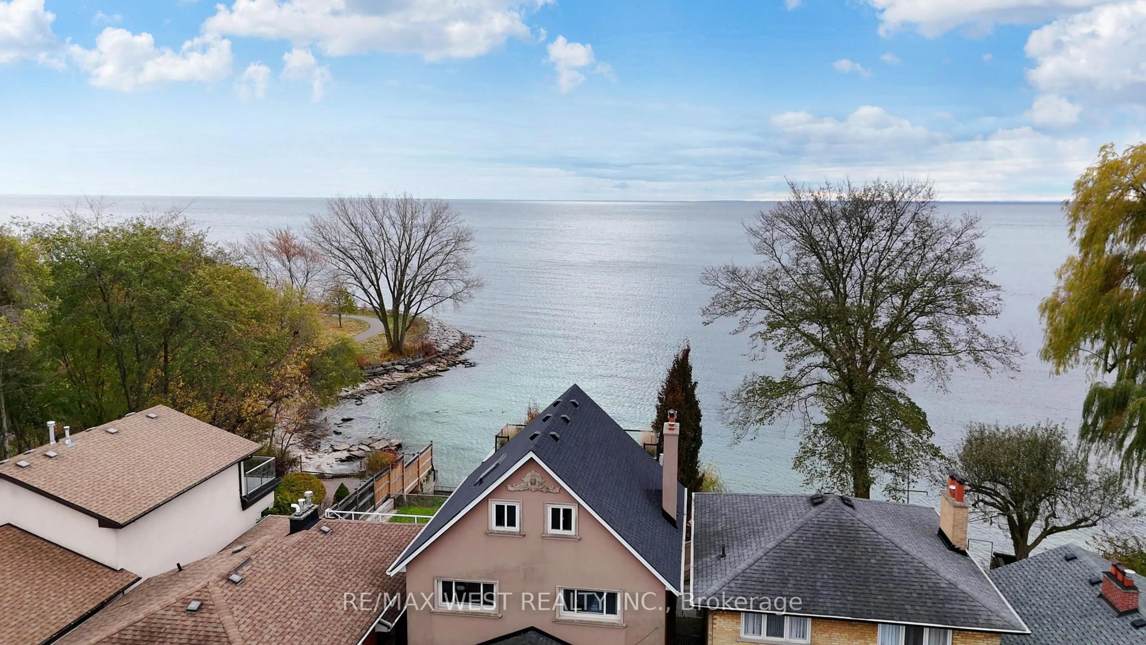 A pic from outside/outdoor area/front of a property/back of a property/a pic from drone, water/lake/river/ocean view for 5 Eleventh St, Toronto Ontario M8V 2G2