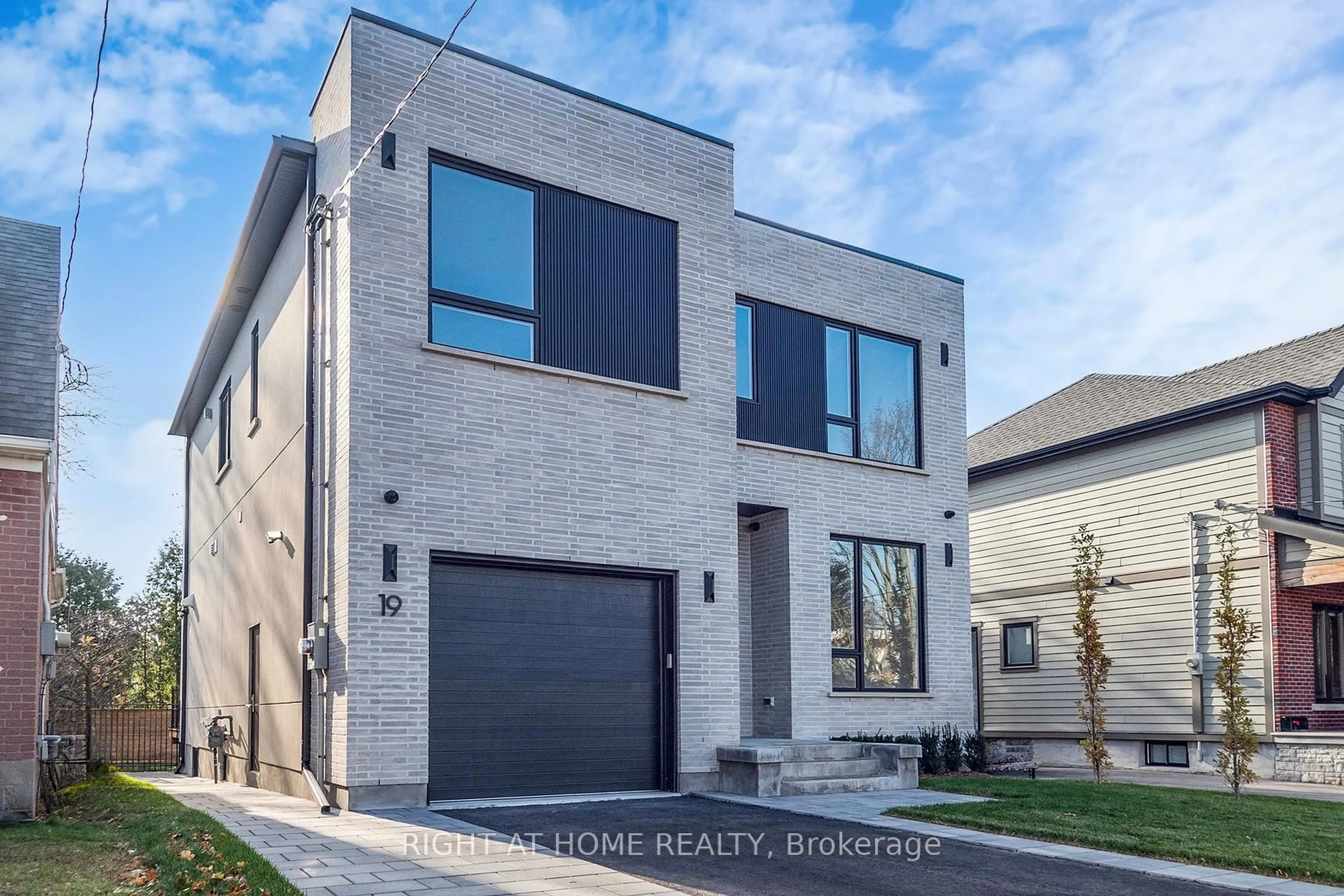 Home with brick exterior material, street for 19 Putney Rd, Toronto Ontario M8W 2K6