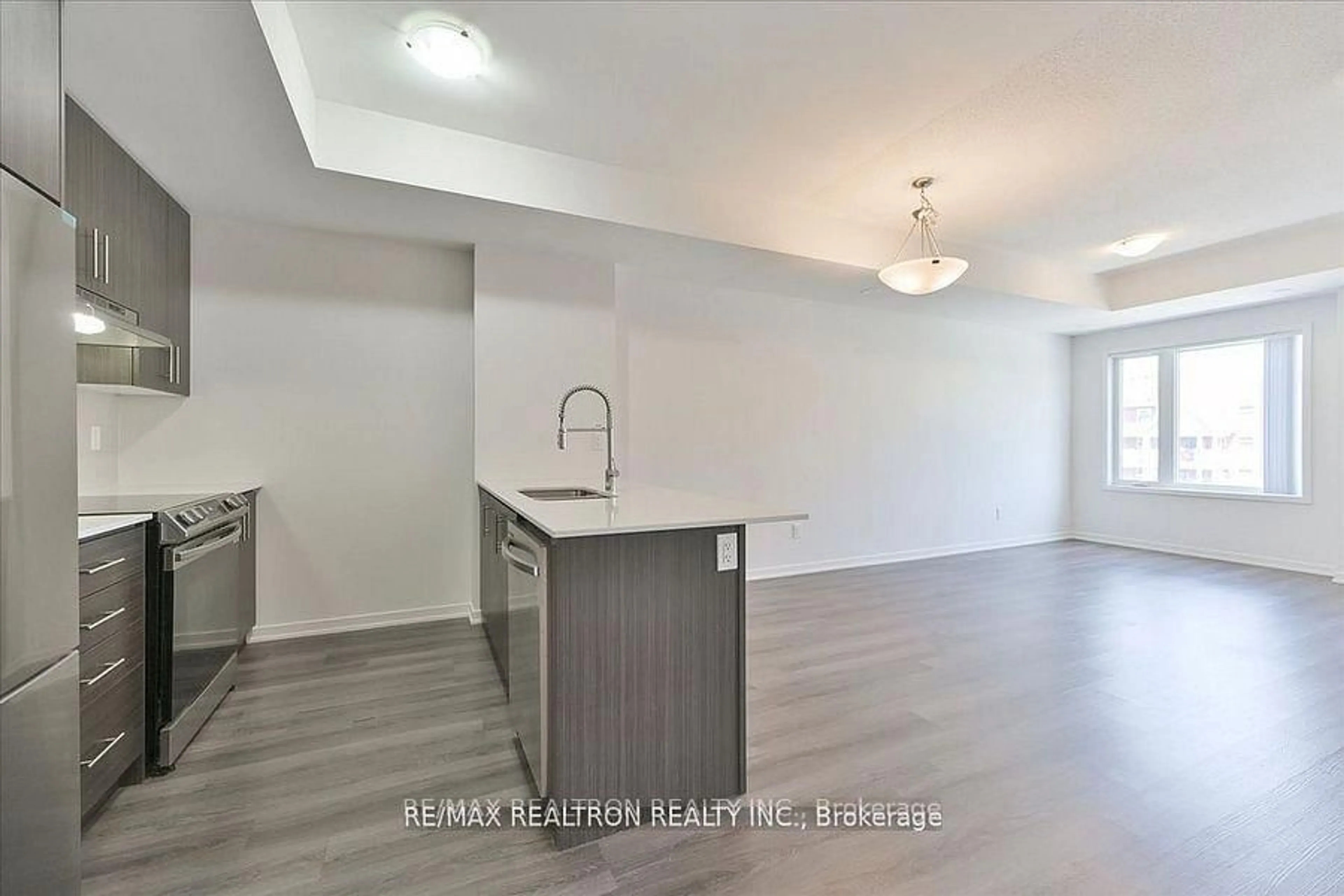 Open concept kitchen, wood/laminate floor for 260 Twelfth St #5, Toronto Ontario M8V 0J6