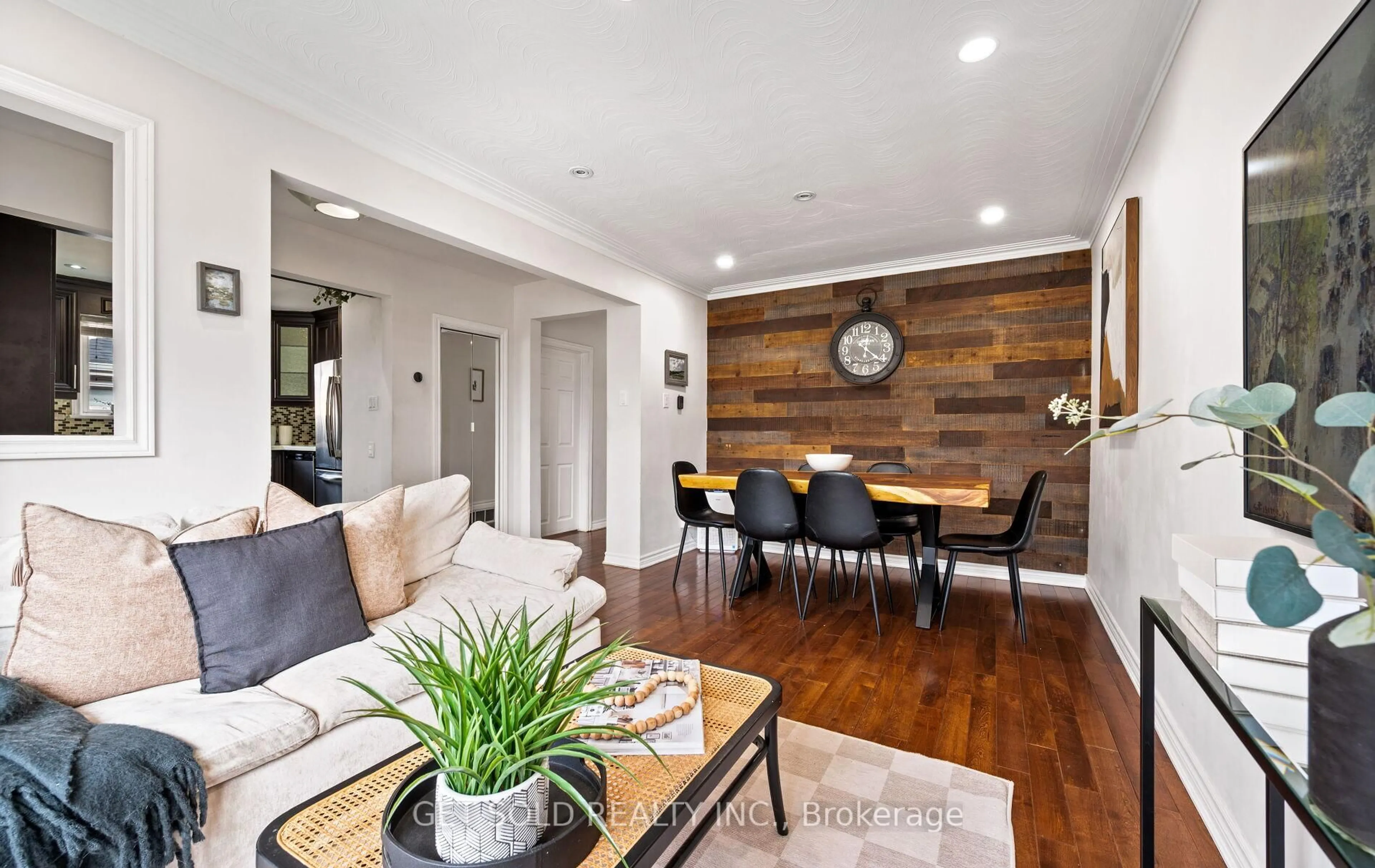 Living room with furniture, wood/laminate floor for 19 Ixworth Rd, Toronto Ontario M9W 4R7