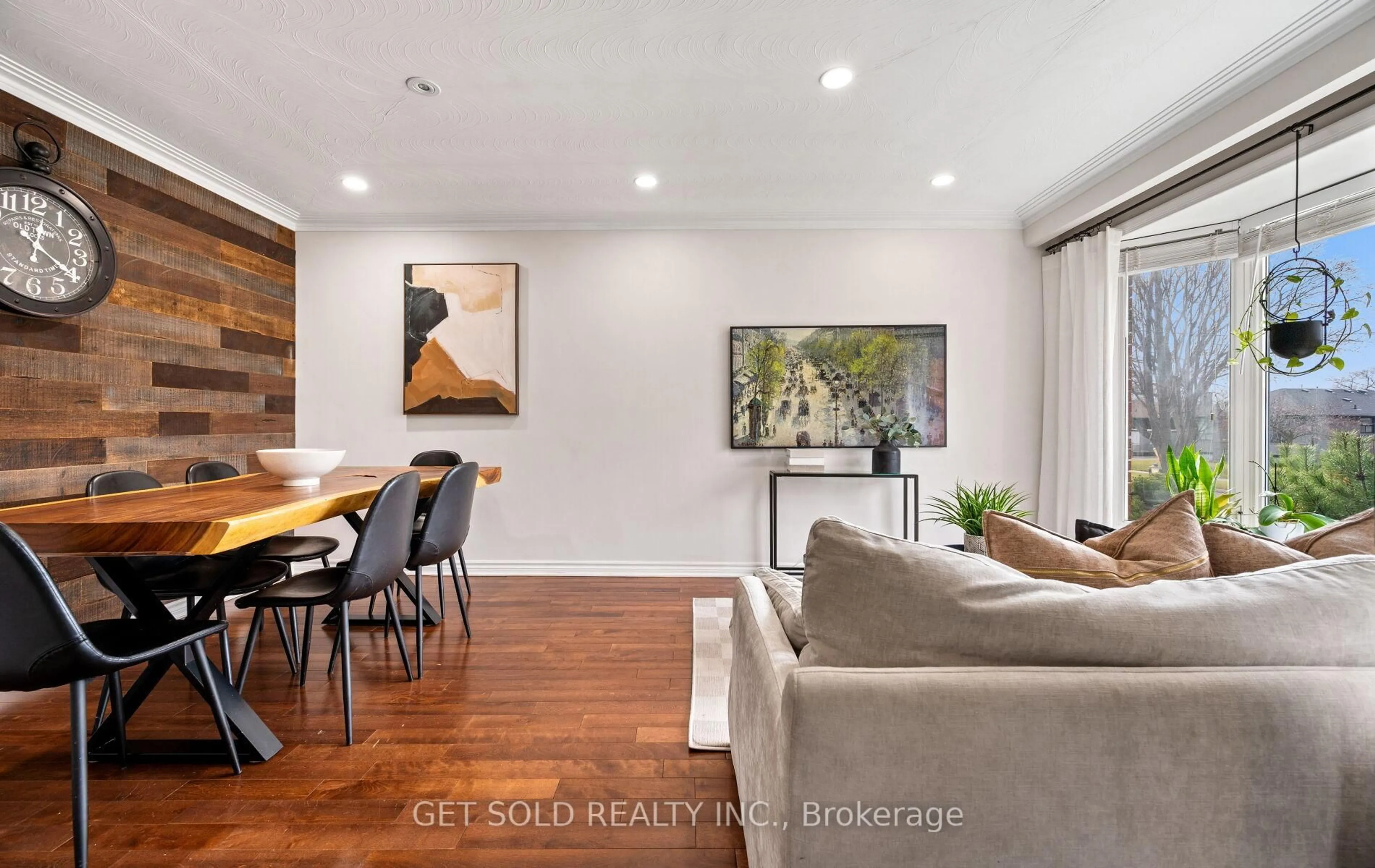 Living room with furniture, wood/laminate floor for 19 Ixworth Rd, Toronto Ontario M9W 4R7