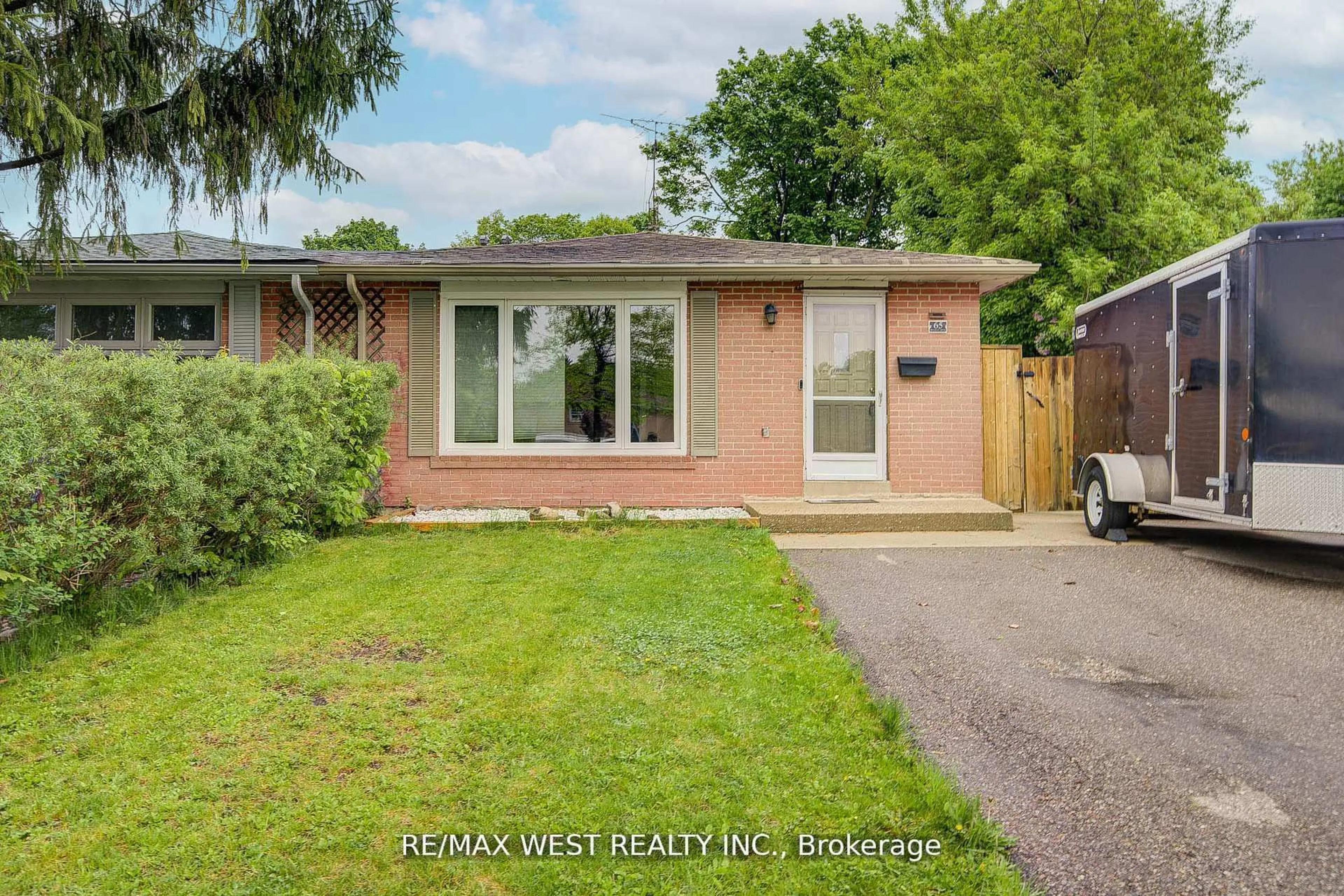 Home with brick exterior material, street for 65 Belmont Dr, Brampton Ontario L6T 2K5