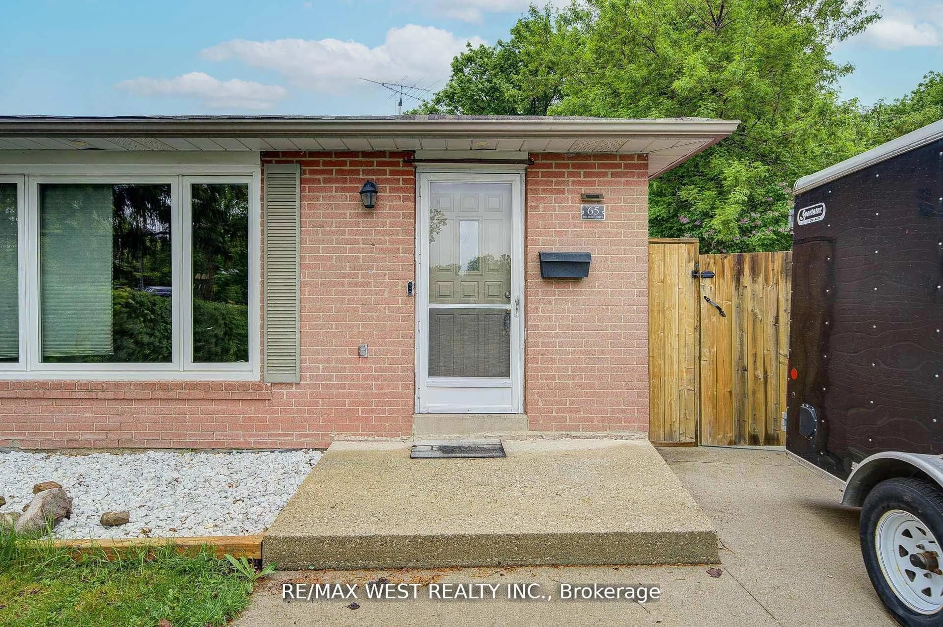 Home with brick exterior material, street for 65 Belmont Dr, Brampton Ontario L6T 2K5