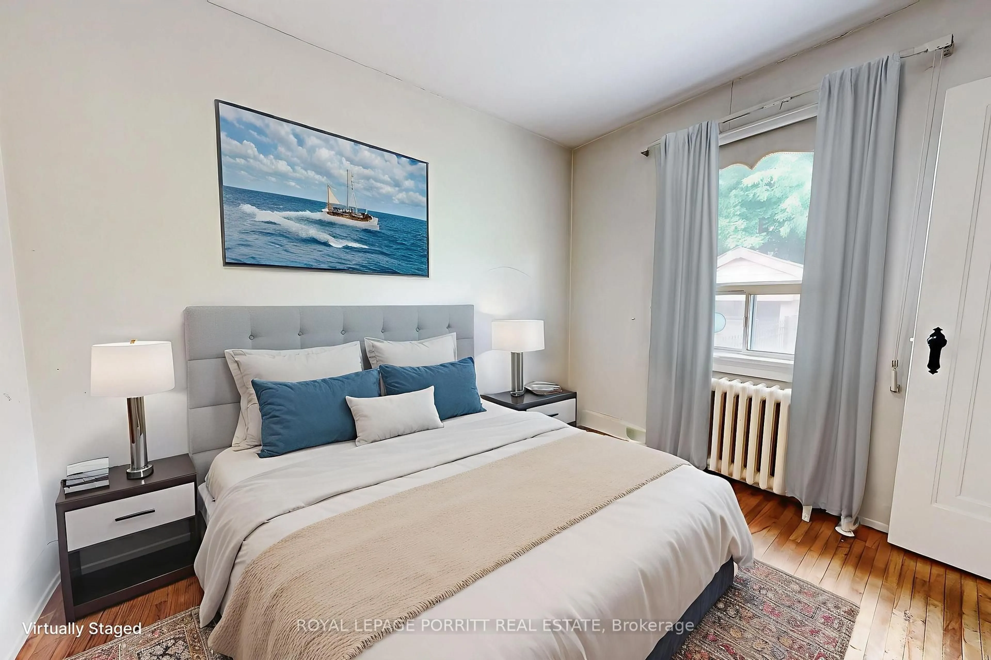 Bedroom with bed, wood/laminate floor for 18 Stephen Dr, Toronto Ontario M8Y 3M6