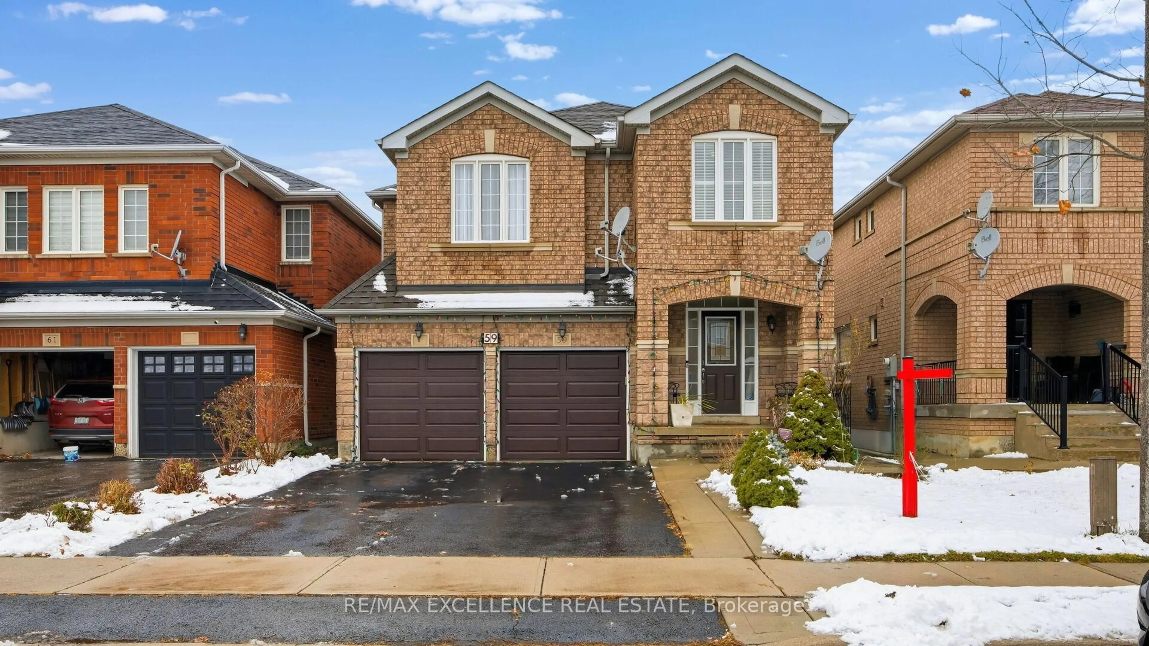 Home with brick exterior material, street for 59 Linderwood Dr, Brampton Ontario L7A 1S4