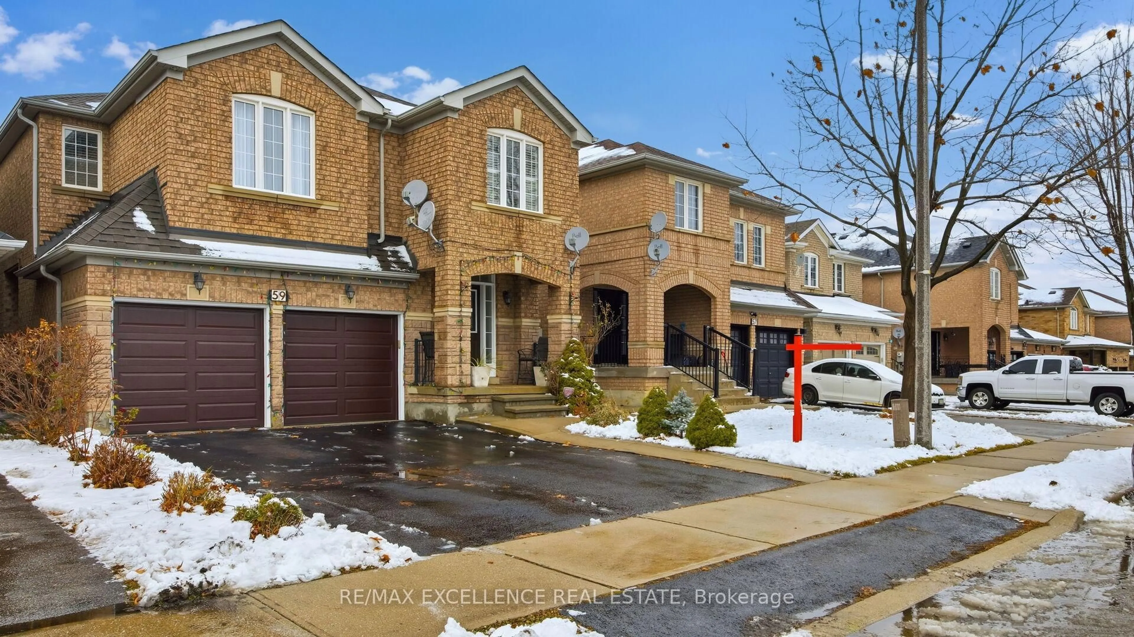 Home with brick exterior material, street for 59 Linderwood Dr, Brampton Ontario L7A 1S4