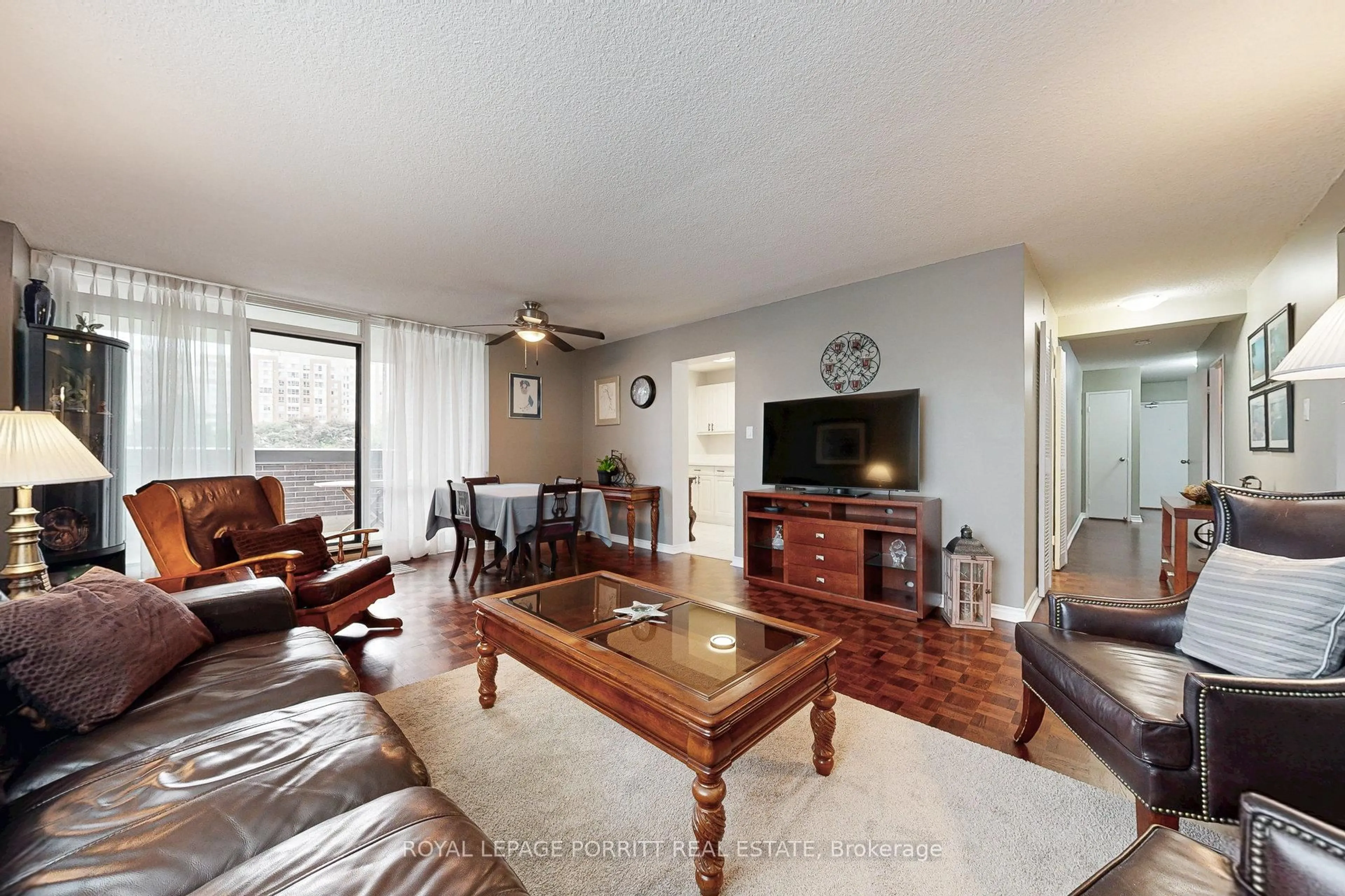 Living room with furniture, unknown for 1535 Lakeshore Rd #201, Mississauga Ontario L5E 3E2