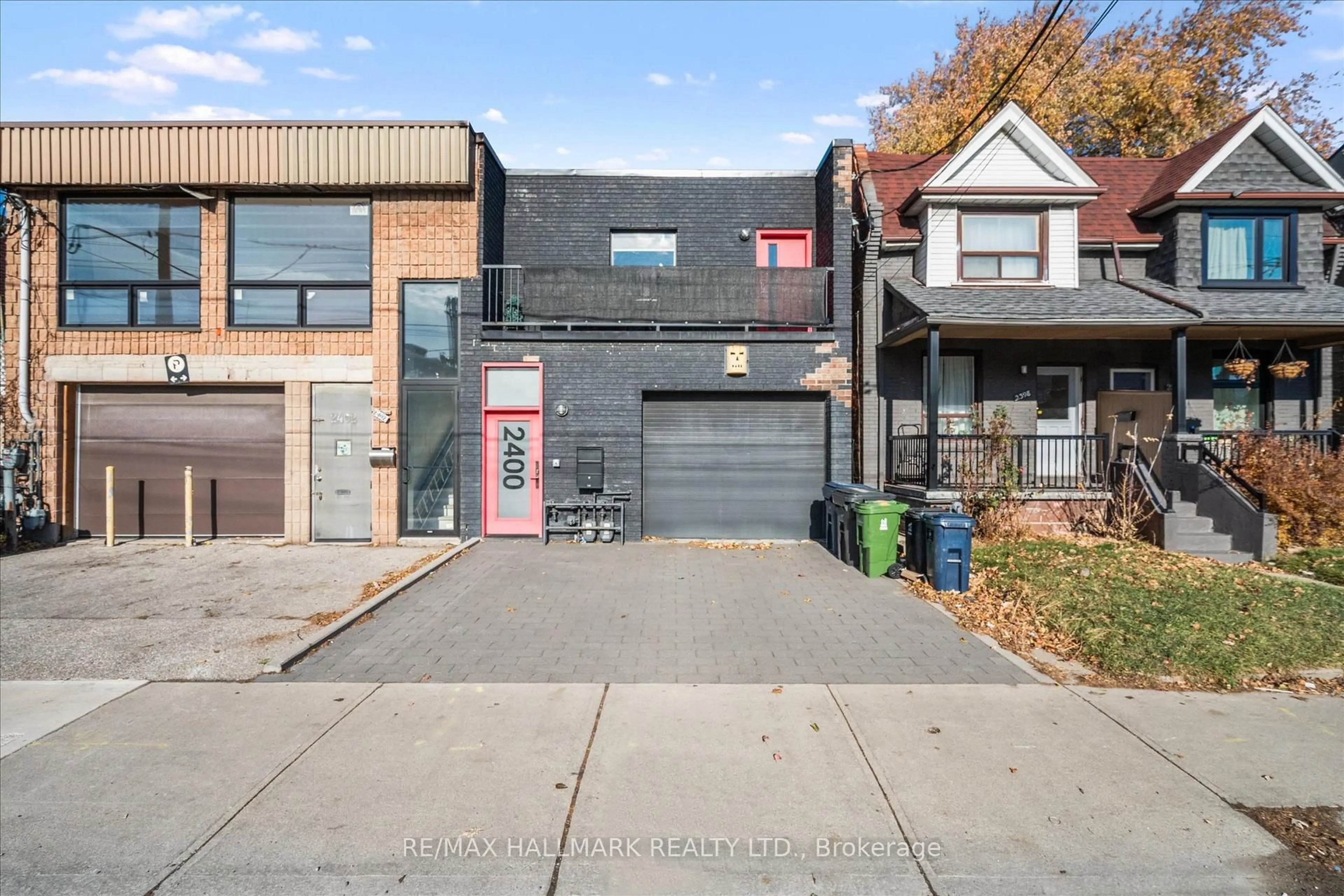 Home with brick exterior material, street for 2400 St. Clair Ave, Toronto Ontario M6N 1L1