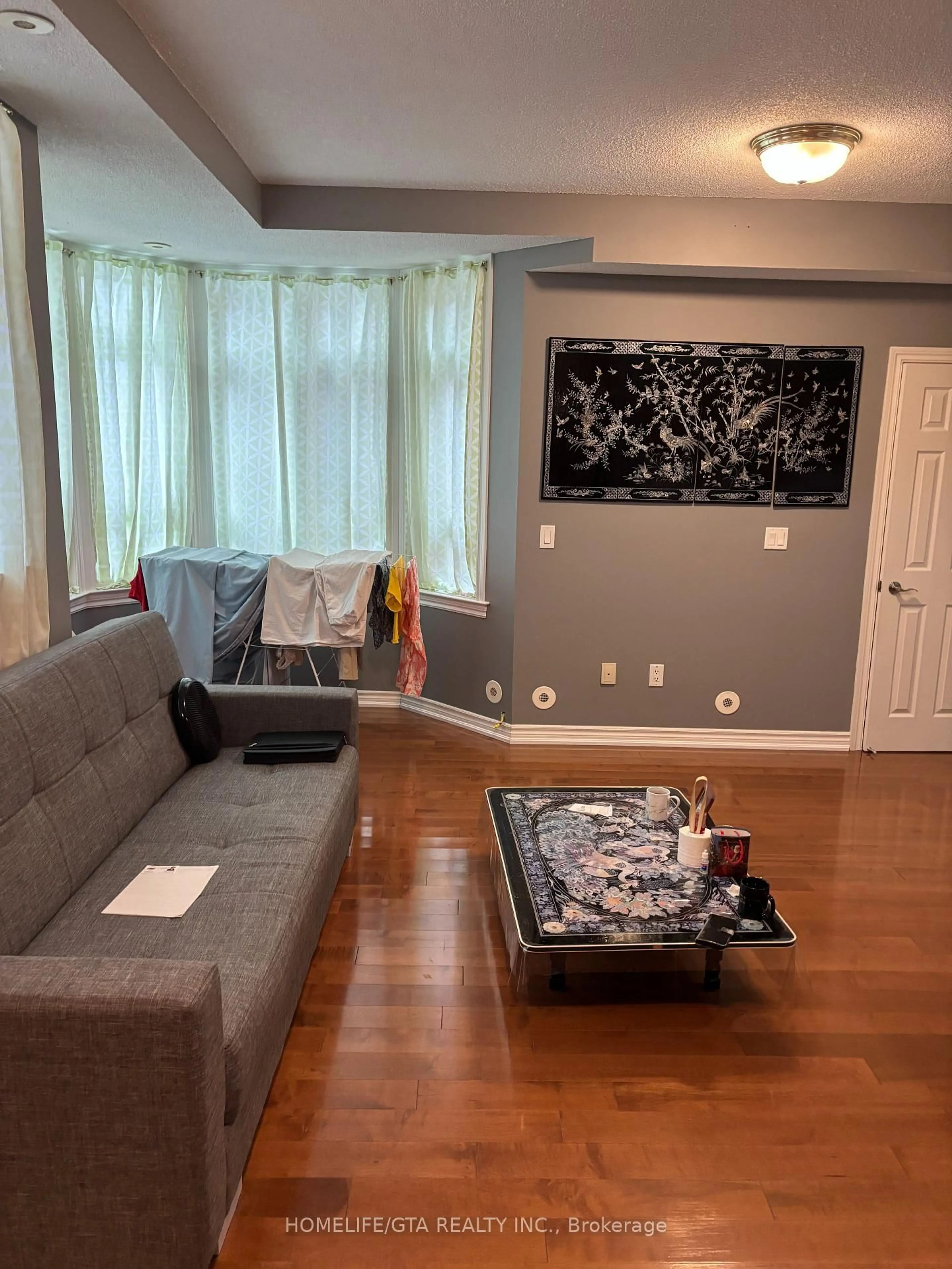 Living room with furniture, unknown for 1947 Lawrence Ave ##2, Toronto Ontario M9N 1H3