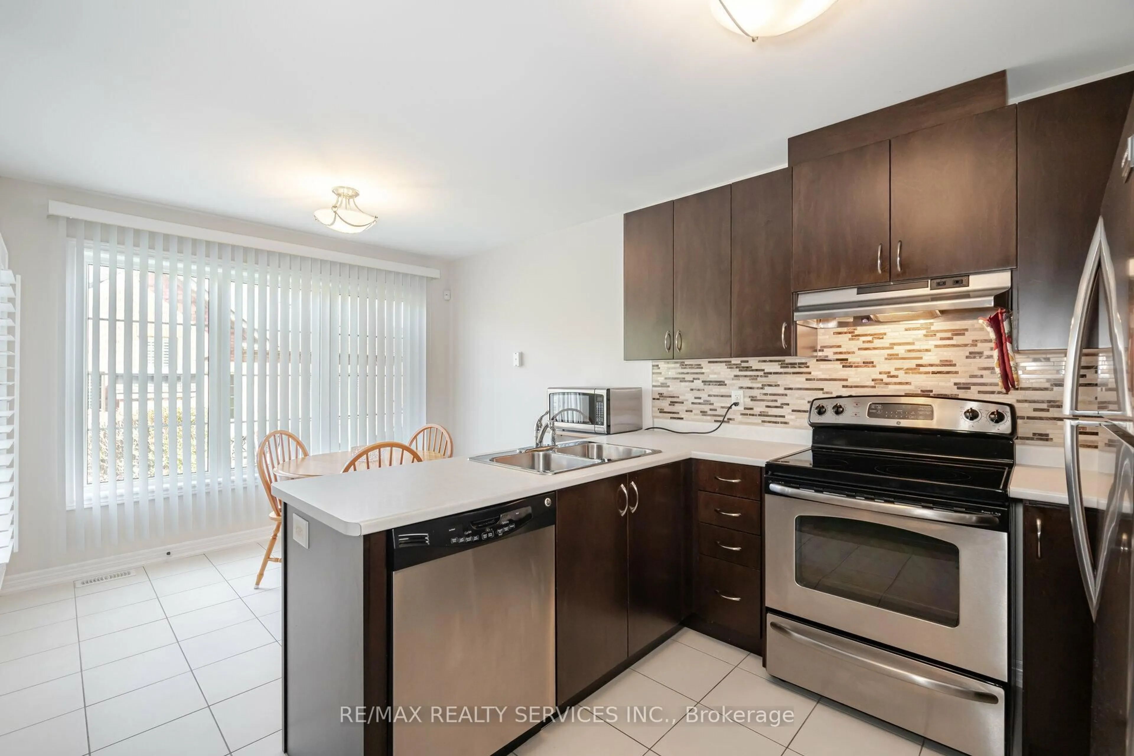 Standard kitchen, ceramic/tile floor for 17 Lacorra Way, Brampton Ontario L6R 3P2