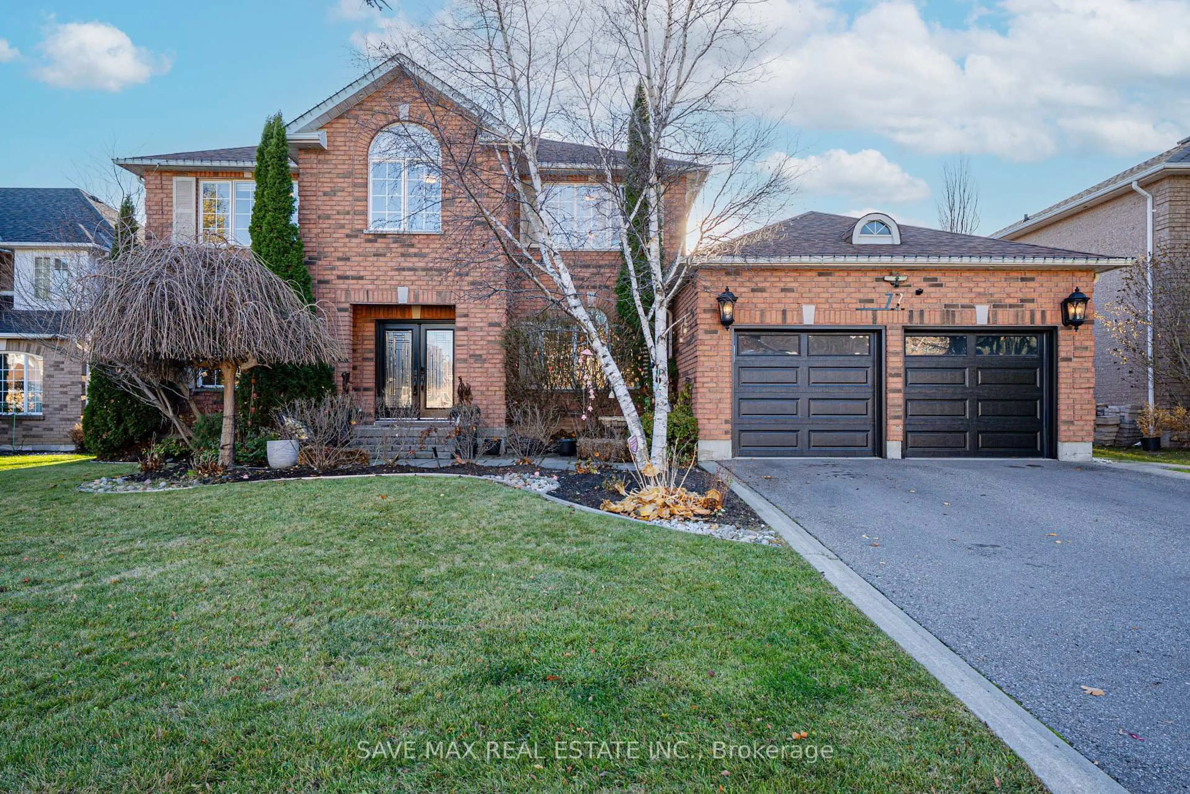 Home with brick exterior material, street for 77 Colonel Bertram Rd, Brampton Ontario L6Z 4T6