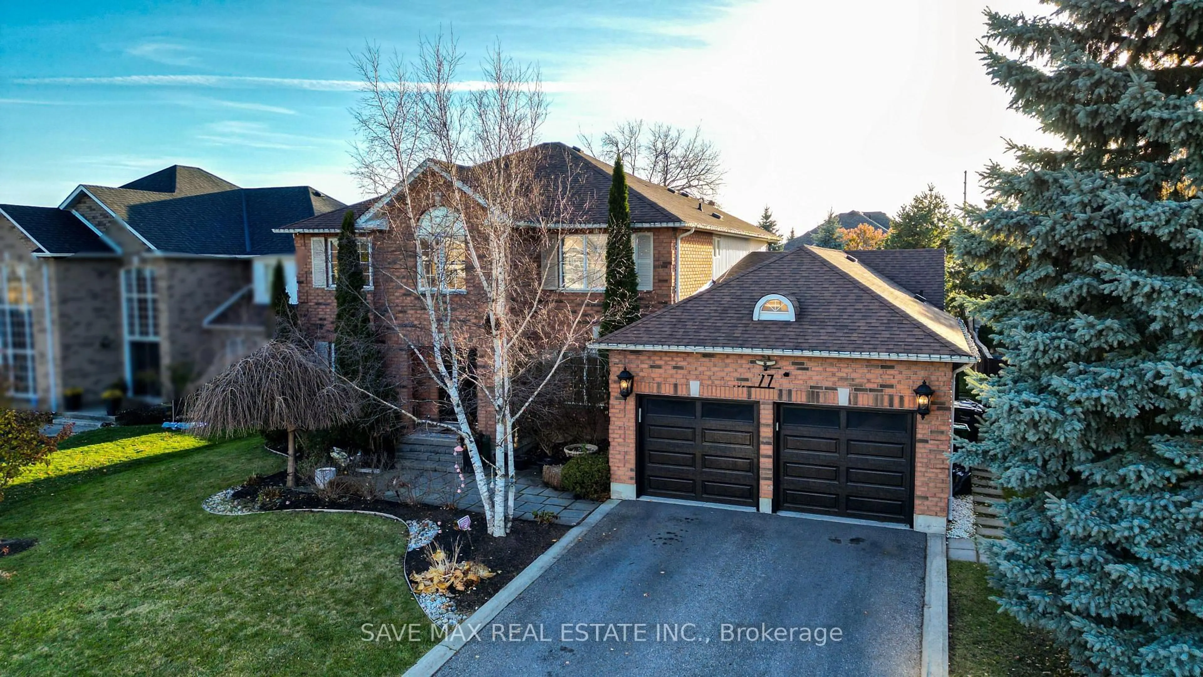 Home with brick exterior material, street for 77 Colonel Bertram Rd, Brampton Ontario L6Z 4T6