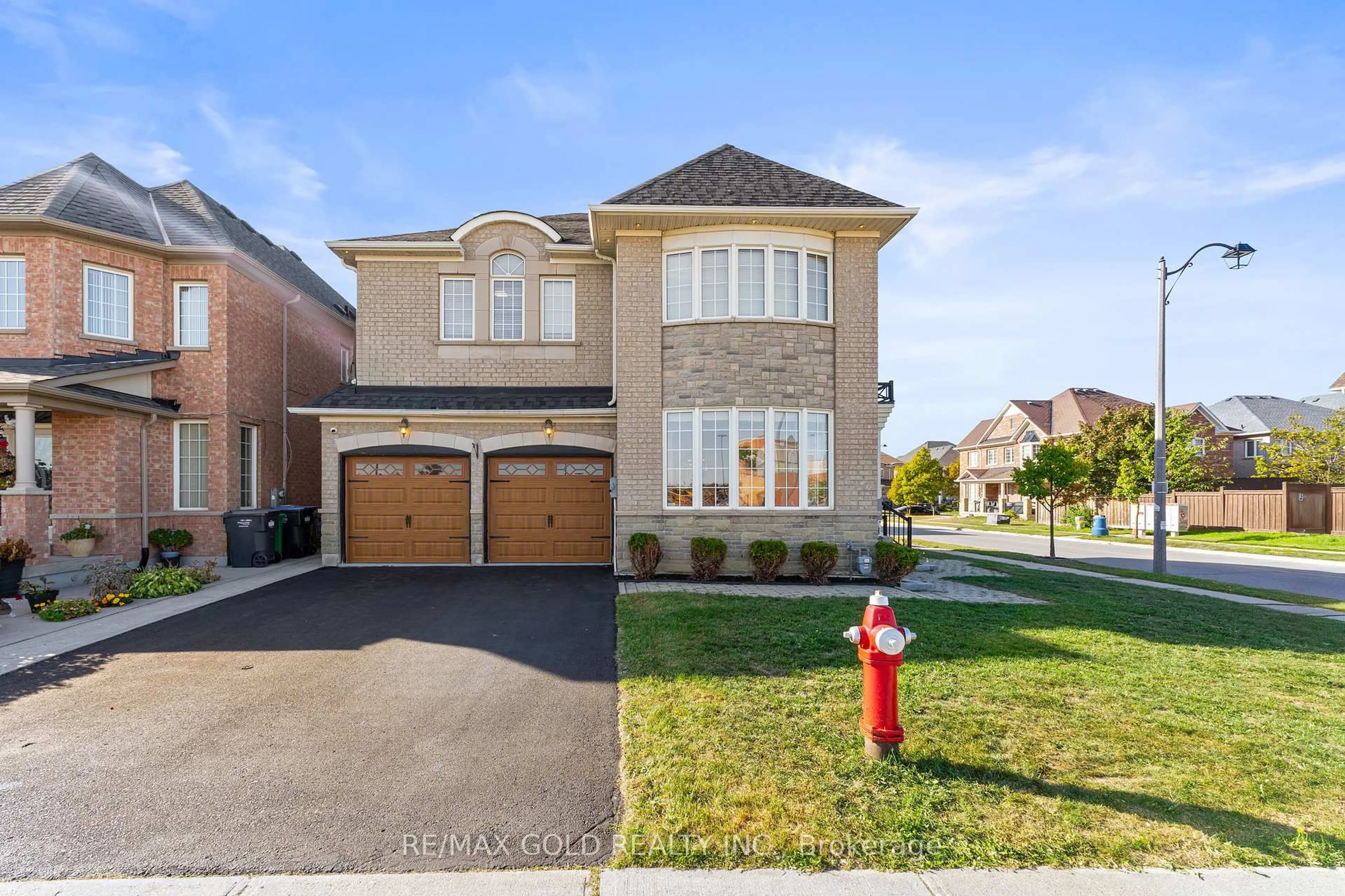 Home with brick exterior material, street for 2 Helman Rd, Brampton Ontario L6R 0R4