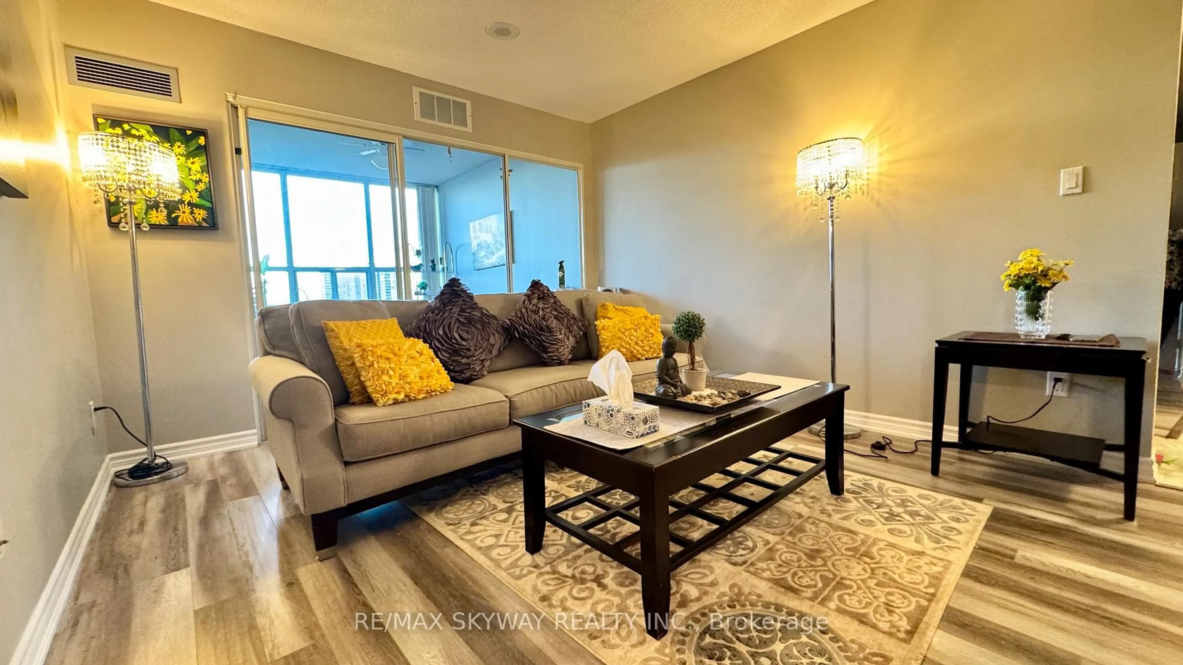 Living room with furniture, unknown for 30 Malta Ave #909, Brampton Ontario L6Y 4S5