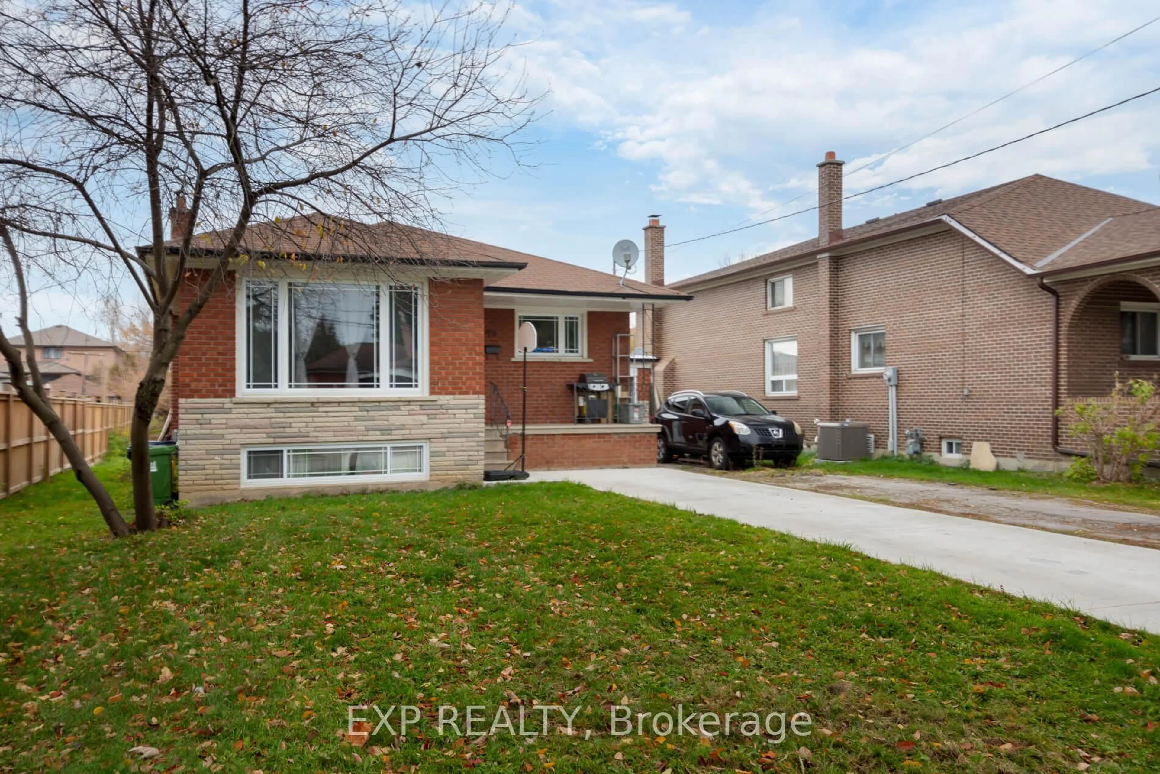 Home with brick exterior material, street for 78 Sunset Tr, Toronto Ontario M9M 1J6