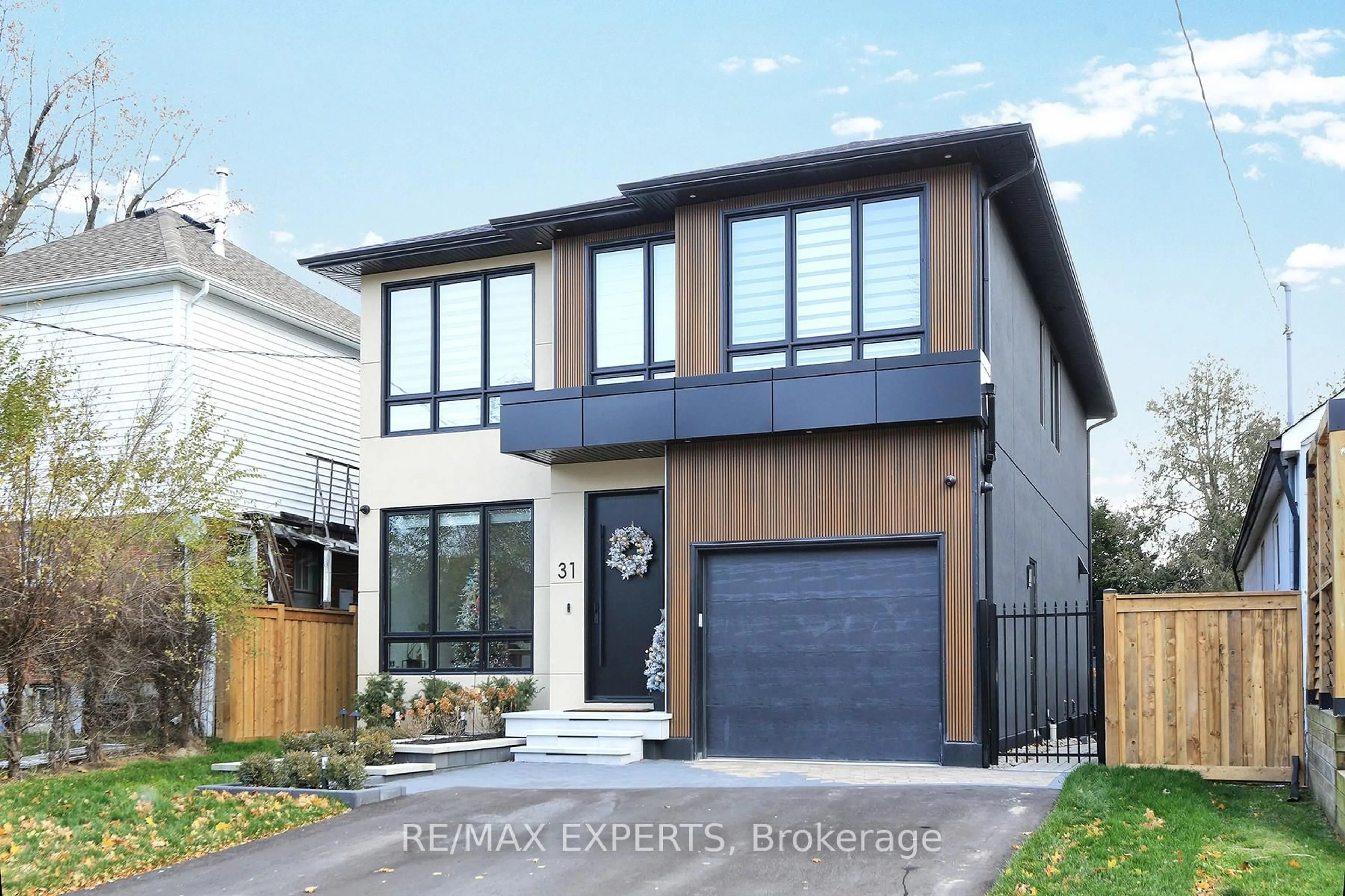 Home with brick exterior material, street for 31 Fulham Dr, Toronto Ontario M8W 4T1
