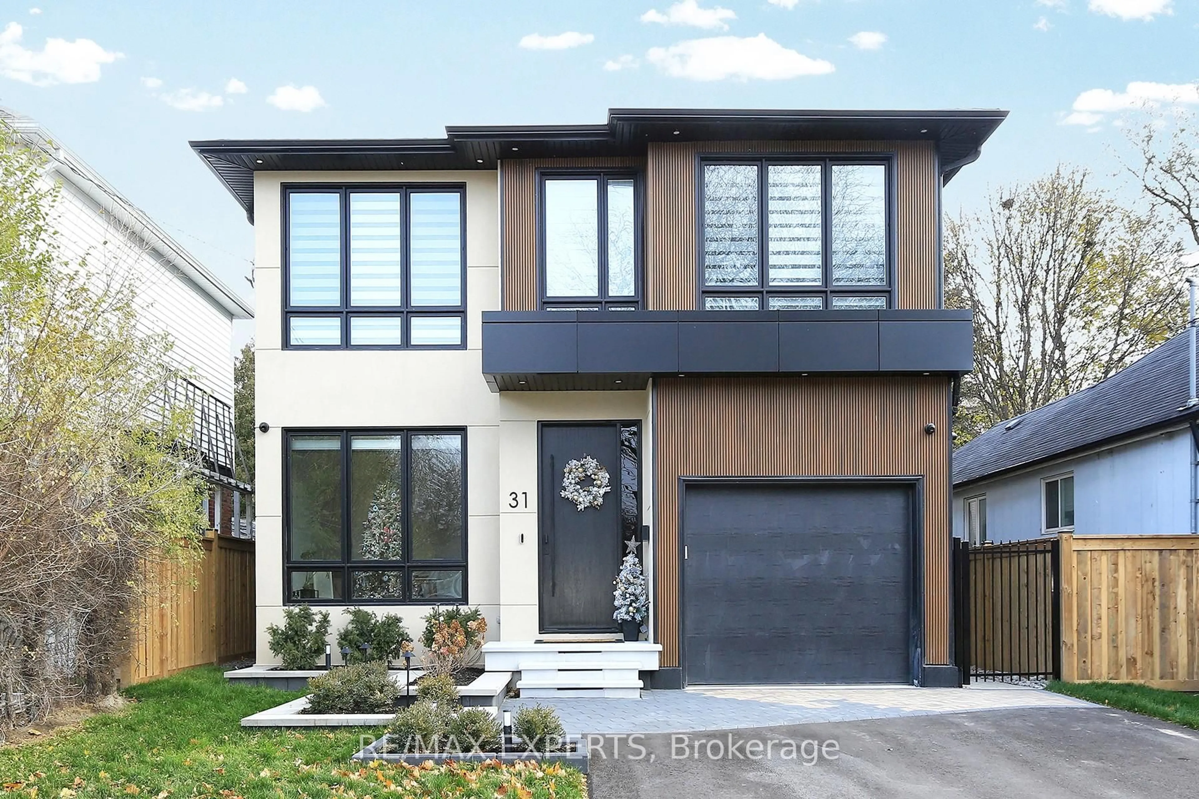 Home with brick exterior material, street for 31 Fulham Dr, Toronto Ontario M8W 4T1