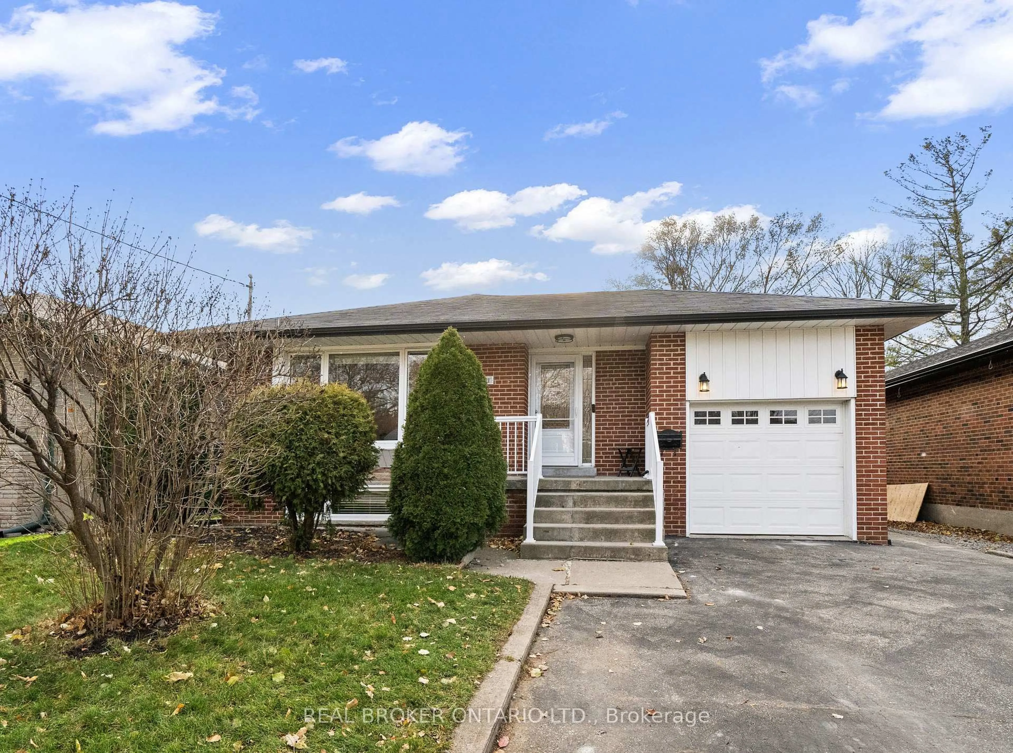 Home with brick exterior material, street for 21 Decarie Circ, Toronto Ontario M9B 3H6