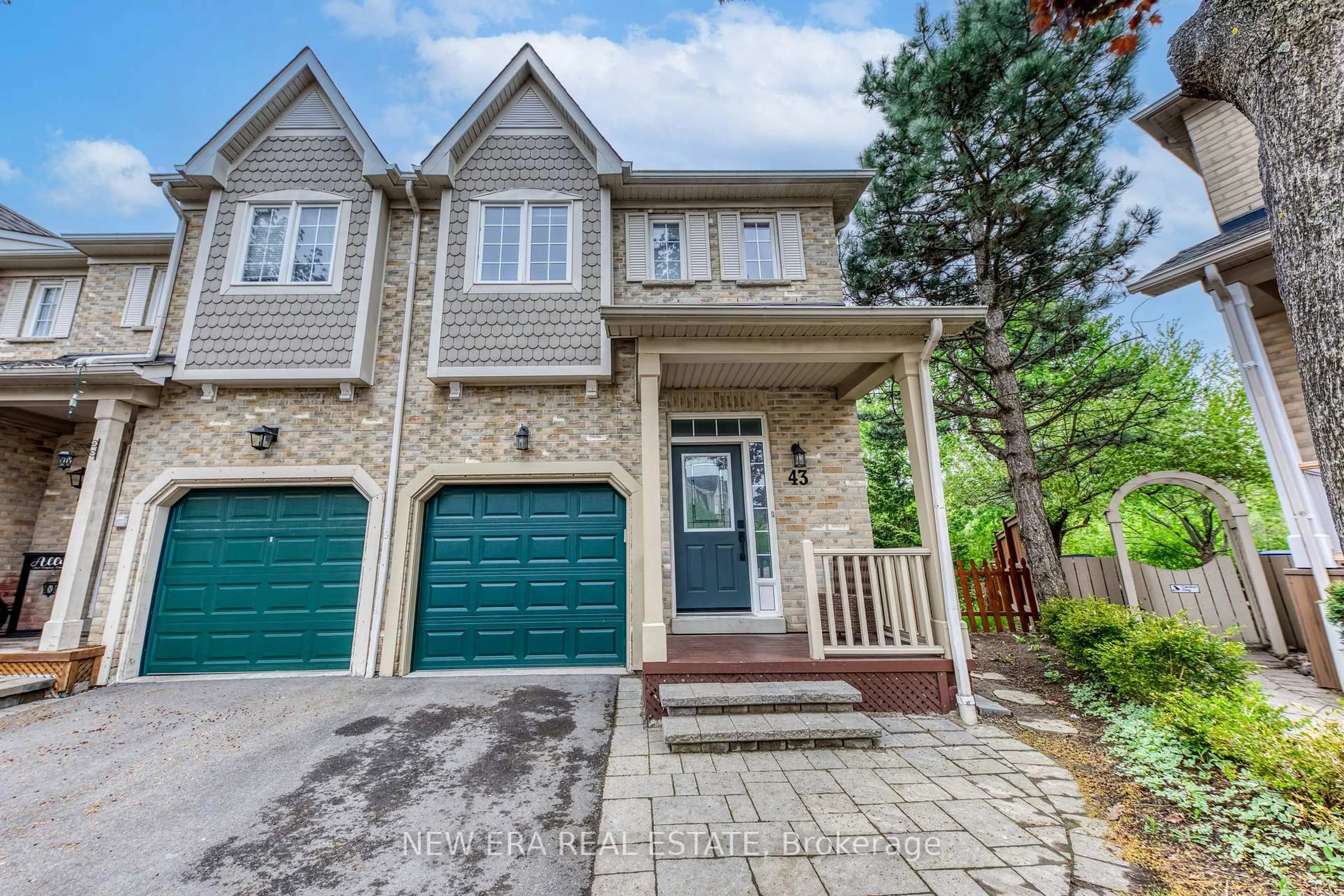 Home with brick exterior material, street for 7284 Bellshire Gate #43, Mississauga Ontario L5N 8E4