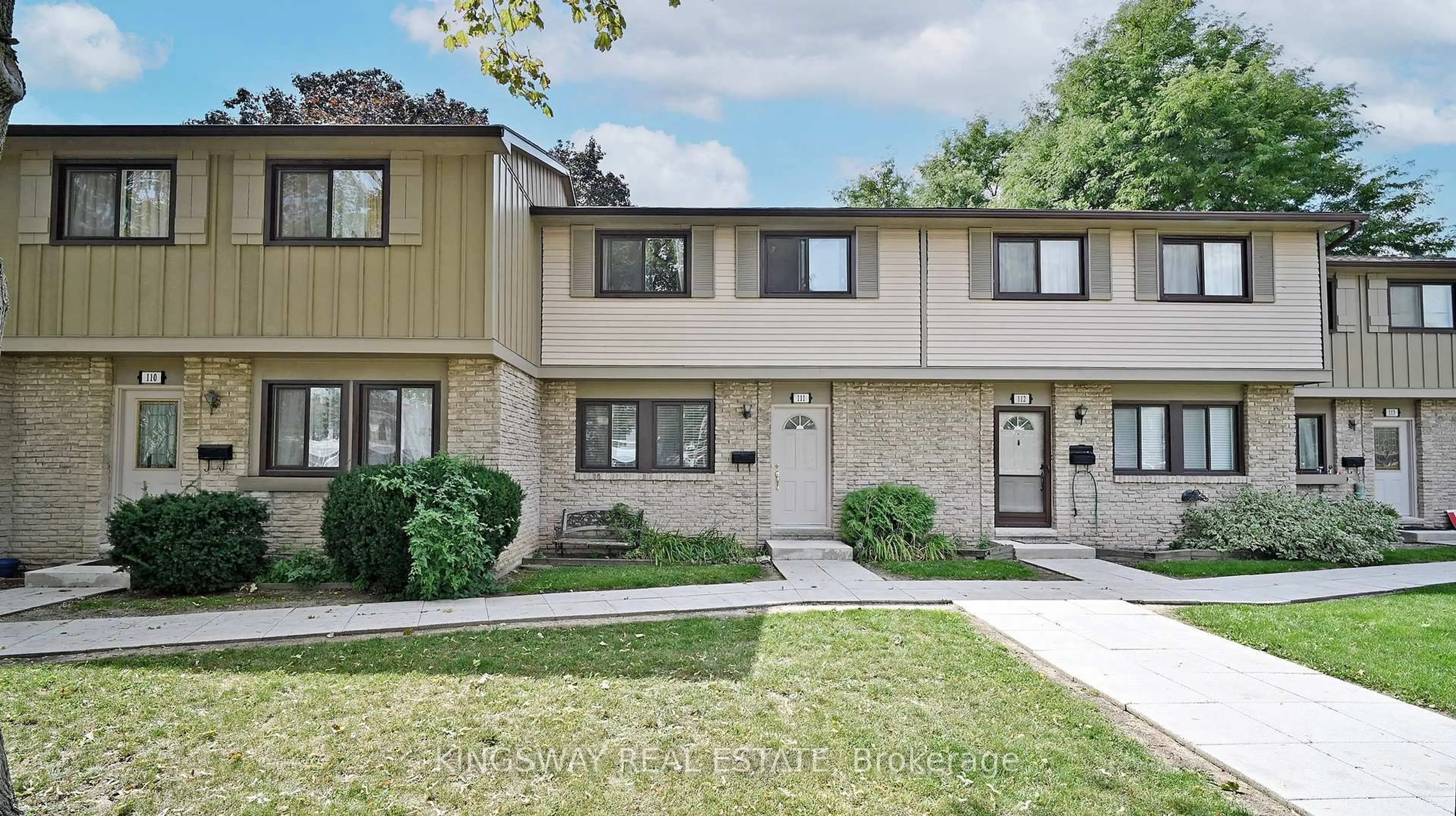 Home with brick exterior material, street for 105 Hansen Rd #111, Brampton Ontario L6V 3C9