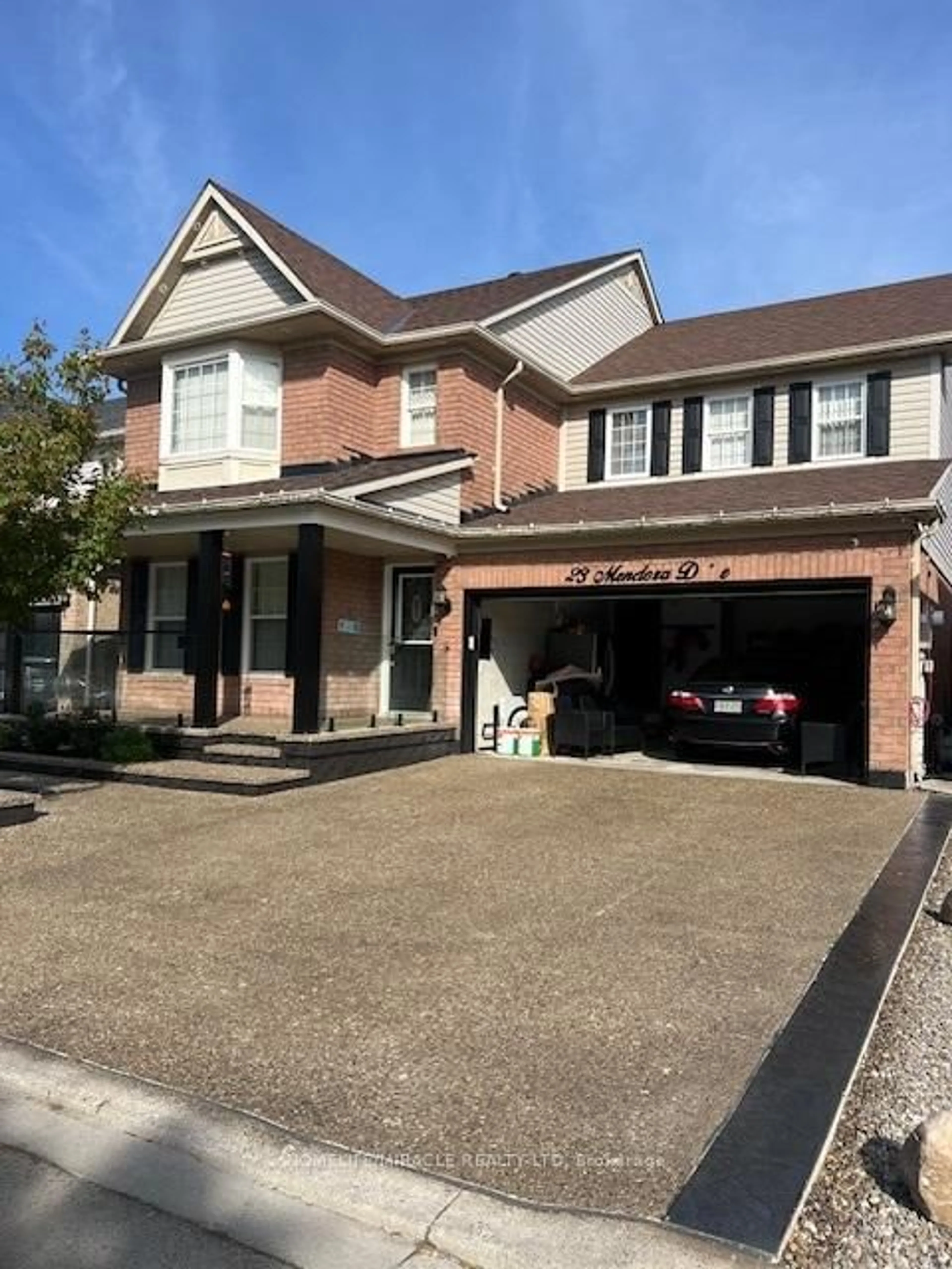 Home with brick exterior material, street for 23 Mendoza Dr, Brampton Ontario L7A 3M1
