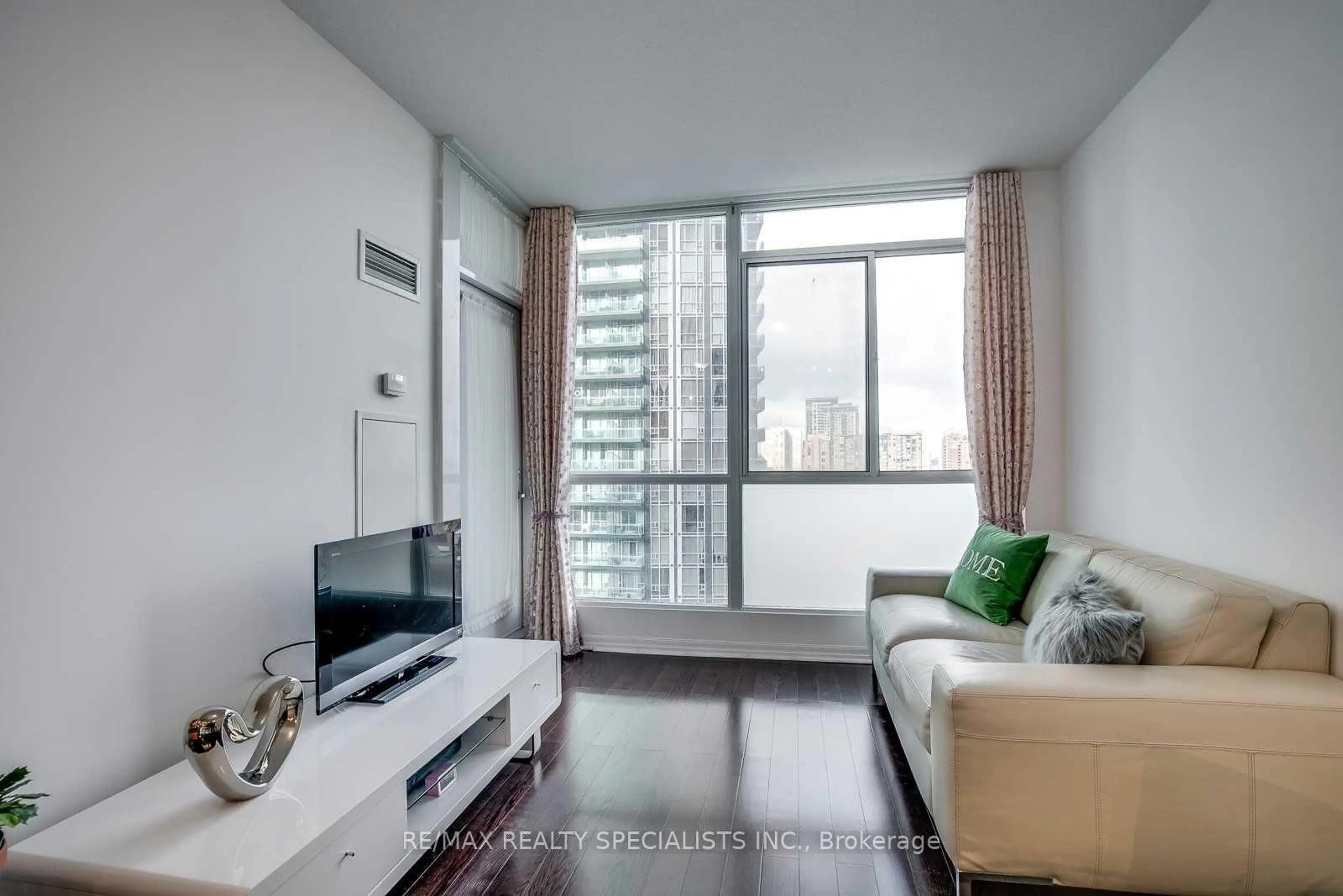 Living room with furniture, unknown for 225 Webb Dr #1406, Mississauga Ontario L5B 4P2