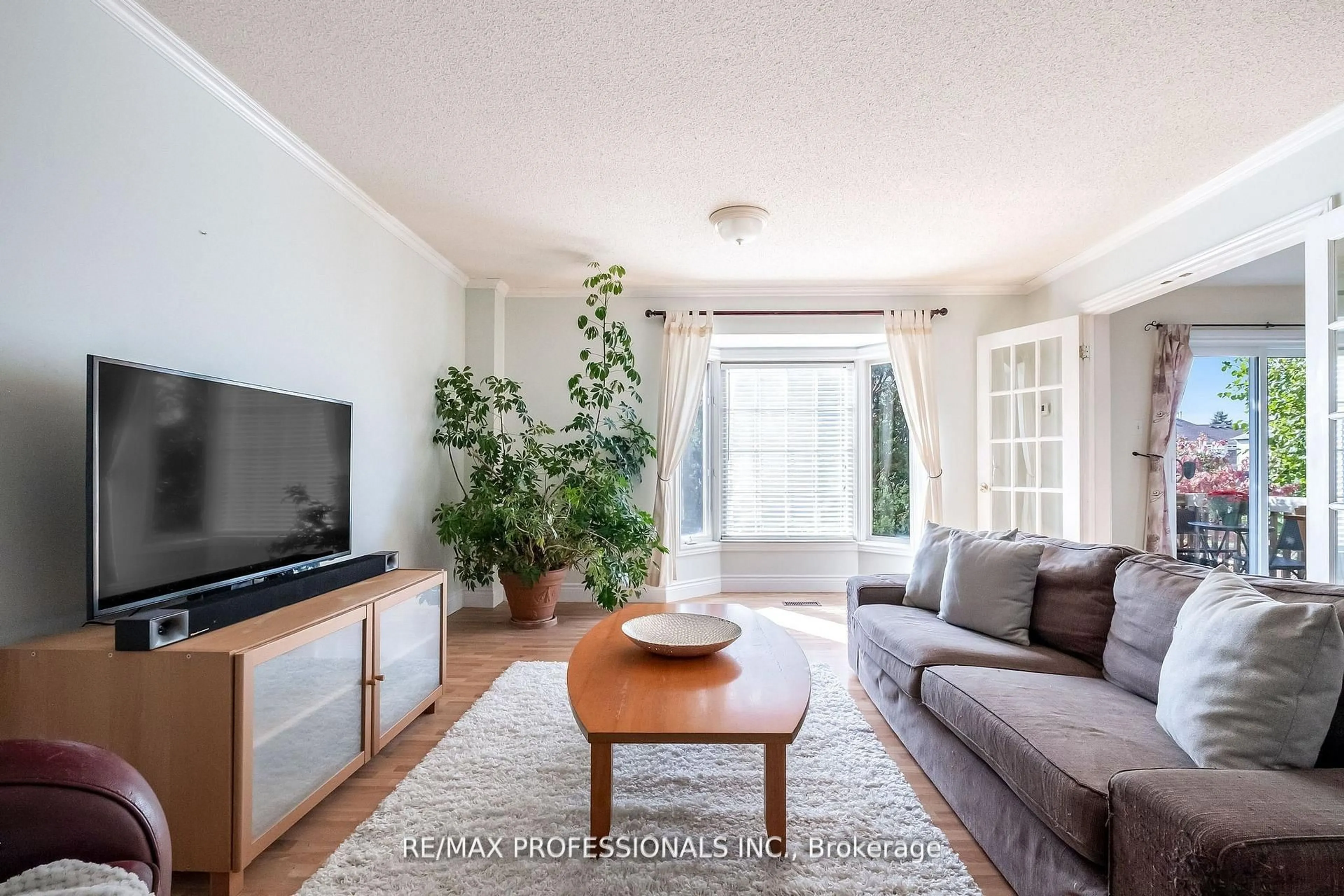 Living room with furniture, unknown for 65 Hickorybush Ave, Brampton Ontario L6R 1C8