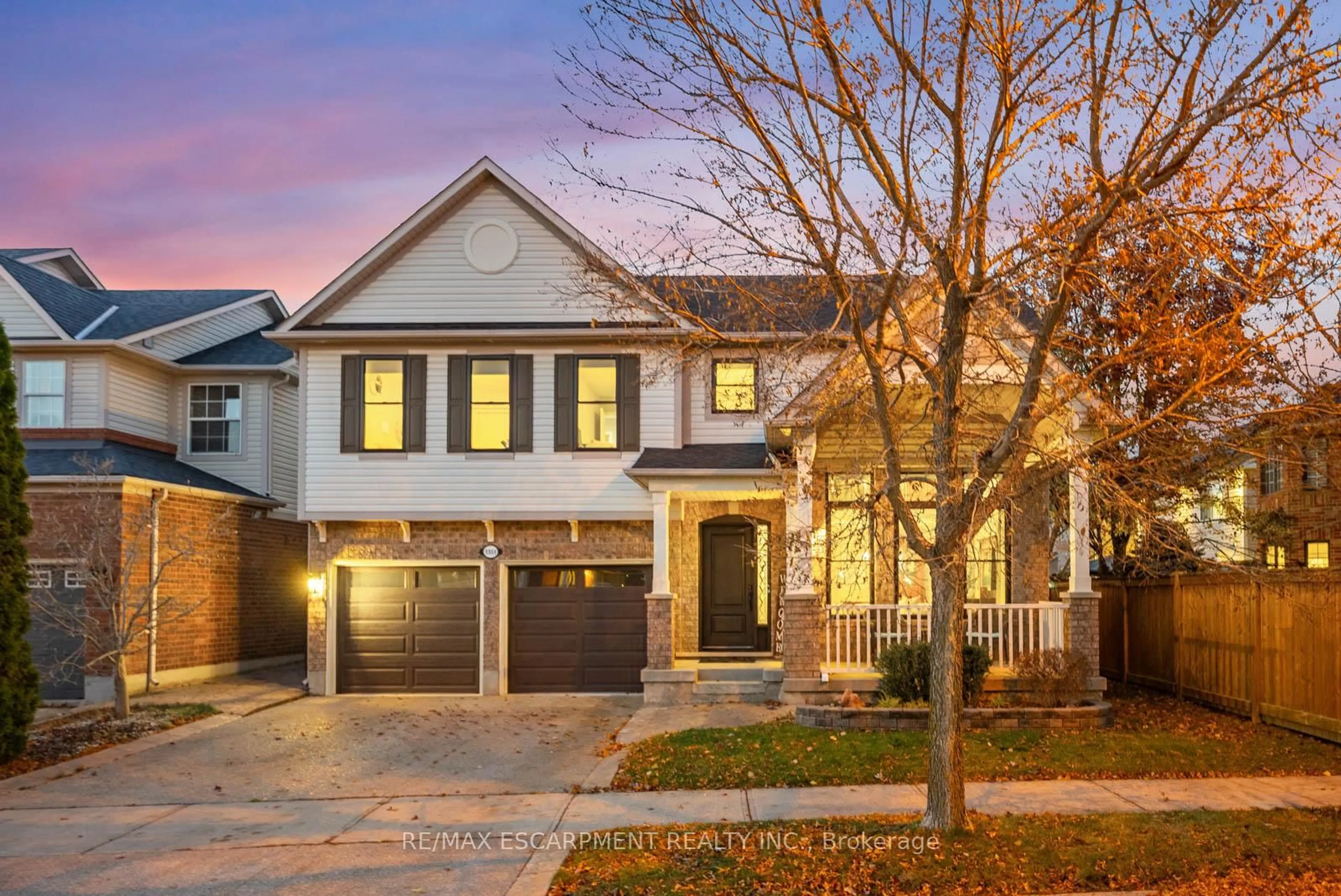 Home with brick exterior material, street for 1351 McGuffin Gate, Milton Ontario L9T 6M3