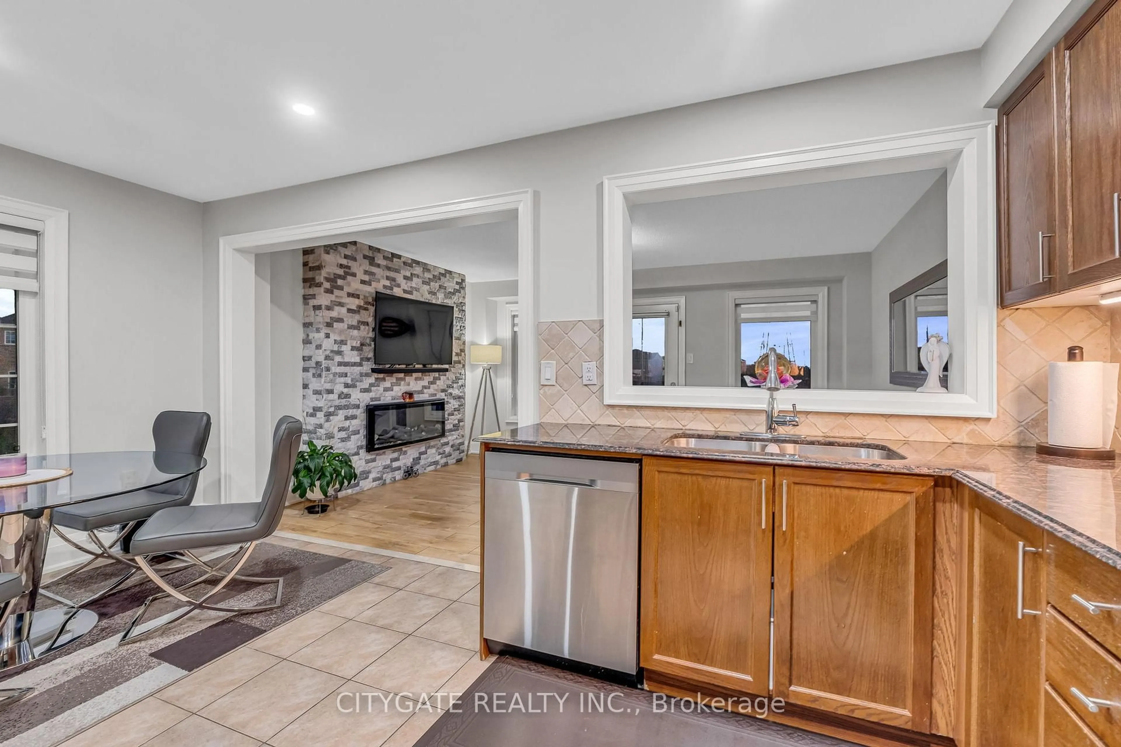 Open concept kitchen, ceramic/tile floor for 151 Spicebush Terr, Brampton Ontario L6X 0K6