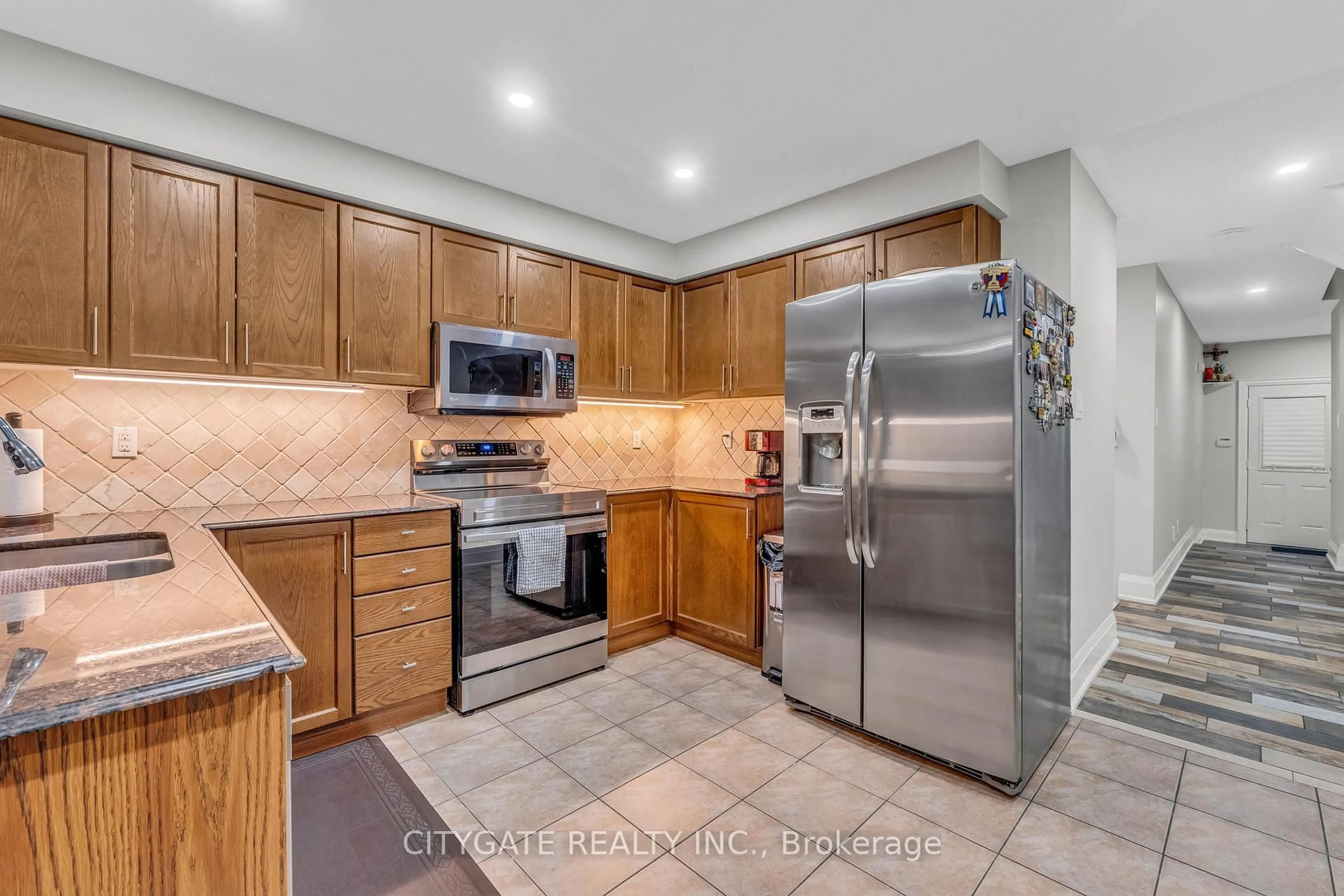 Standard kitchen, ceramic/tile floor for 151 Spicebush Terr, Brampton Ontario L6X 0K6