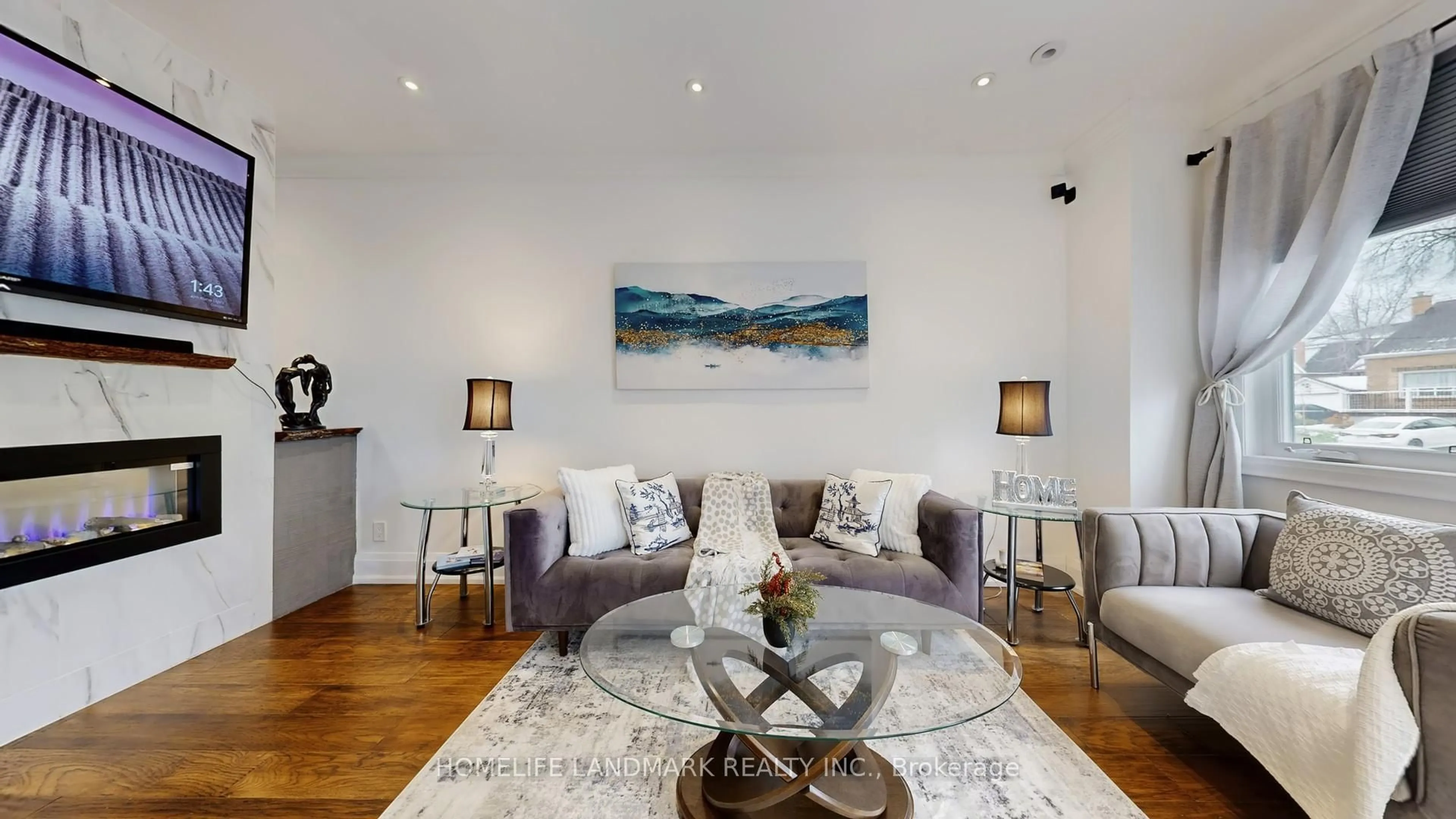 Living room with furniture, wood/laminate floor for 110 Richardson Ave, Toronto Ontario M6M 3S1