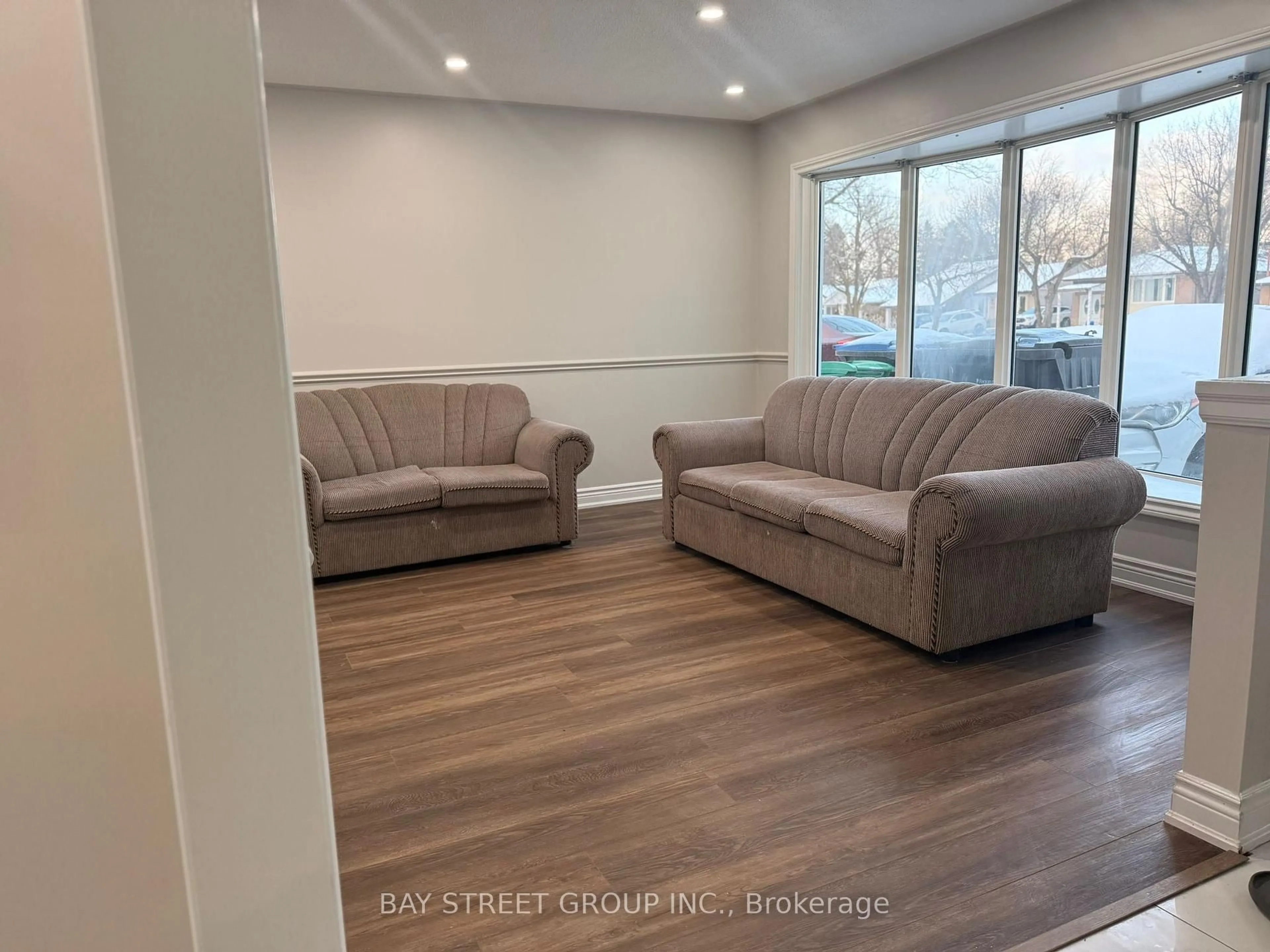 Living room with furniture, unknown for 193 Mcmurchy Ave, Brampton Ontario L6Y 1Z2