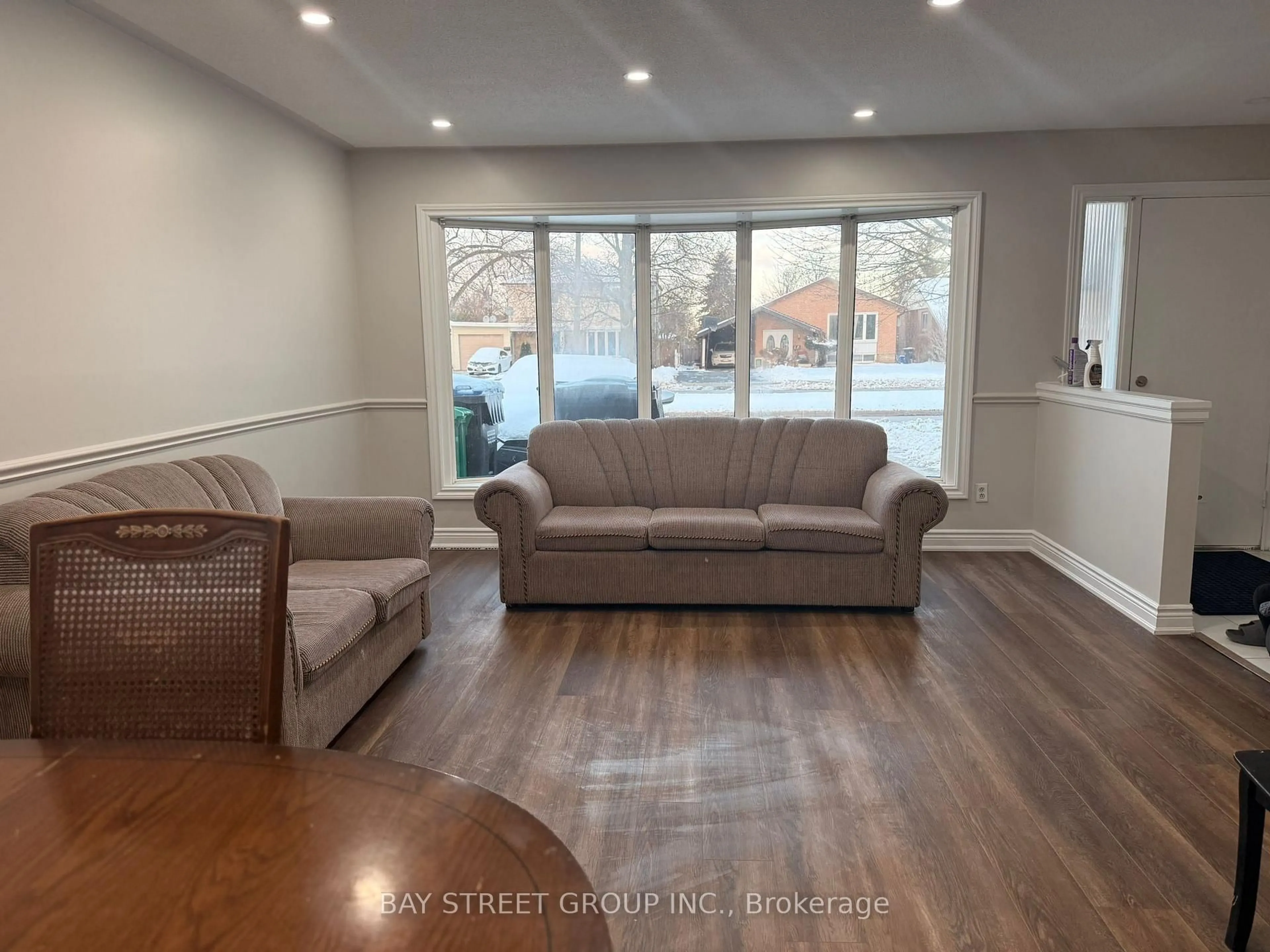 Living room with furniture, unknown for 193 Mcmurchy Ave, Brampton Ontario L6Y 1Z2