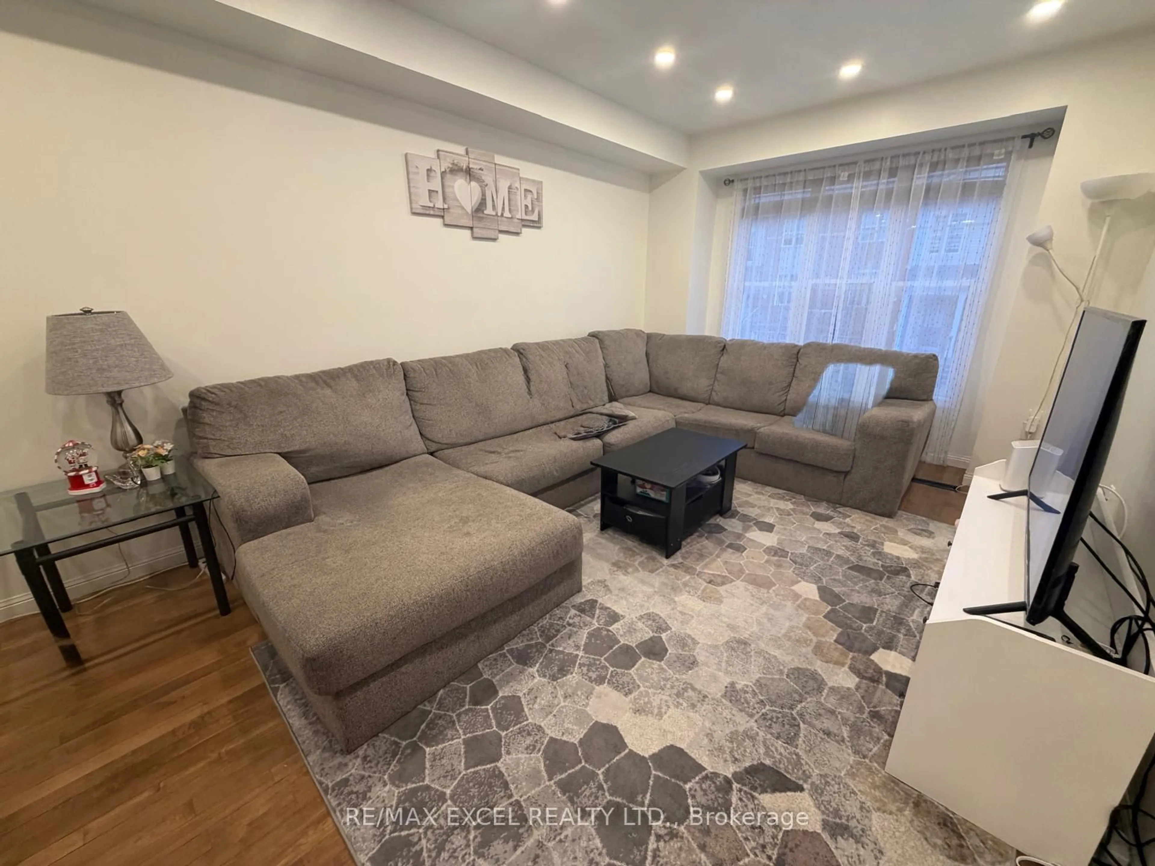 Living room with furniture, unknown for 5980 Whitehorn Ave #161, Mississauga Ontario L5V 2Y3