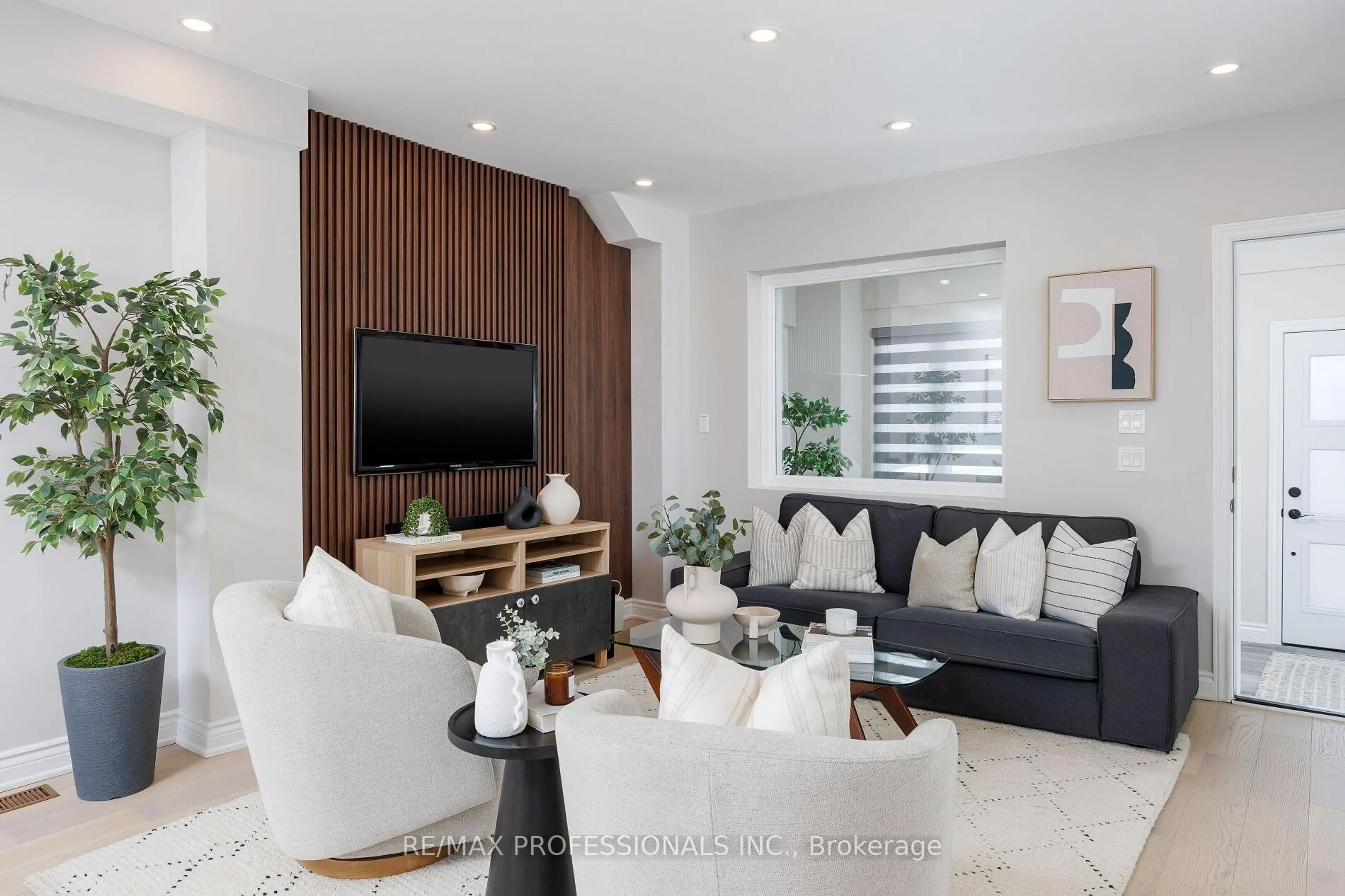 Living room with furniture, unknown for 545 Runnymede Rd, Toronto Ontario M6S 2Z8