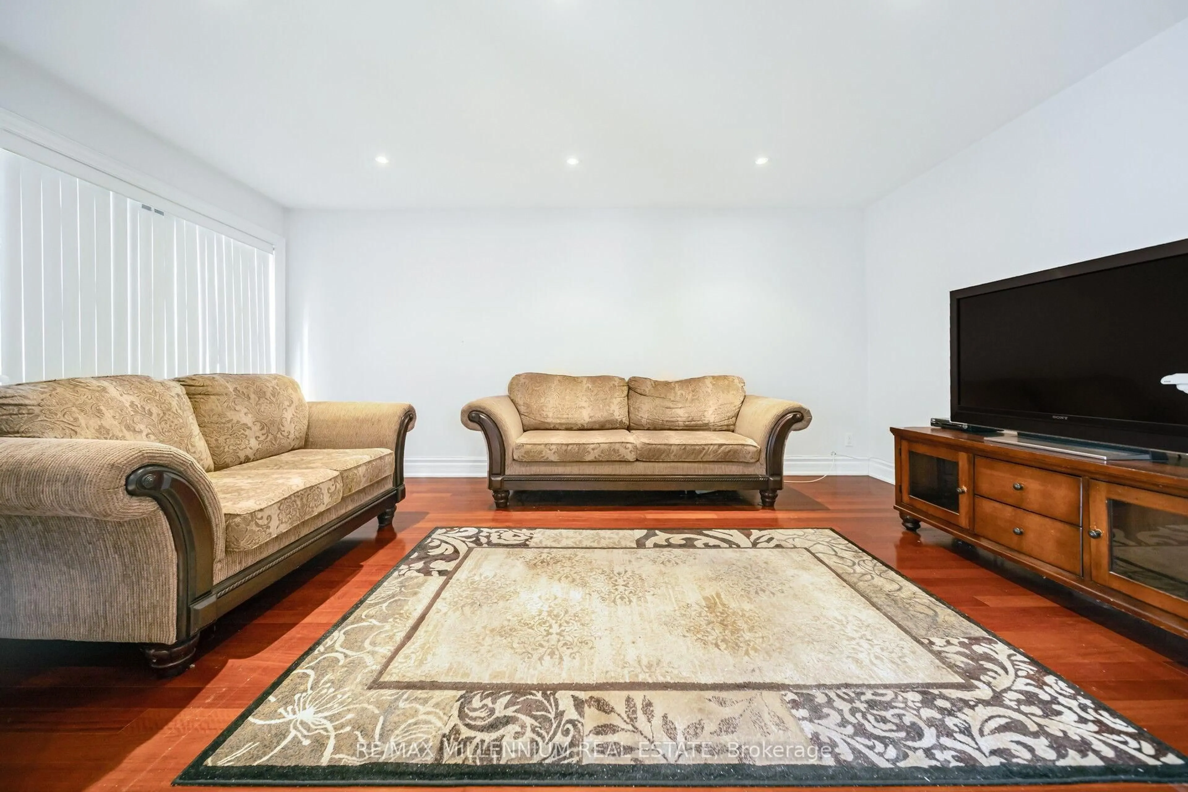 Living room with furniture, unknown for 226 Falstaff Ave, Toronto Ontario M6L 2G1