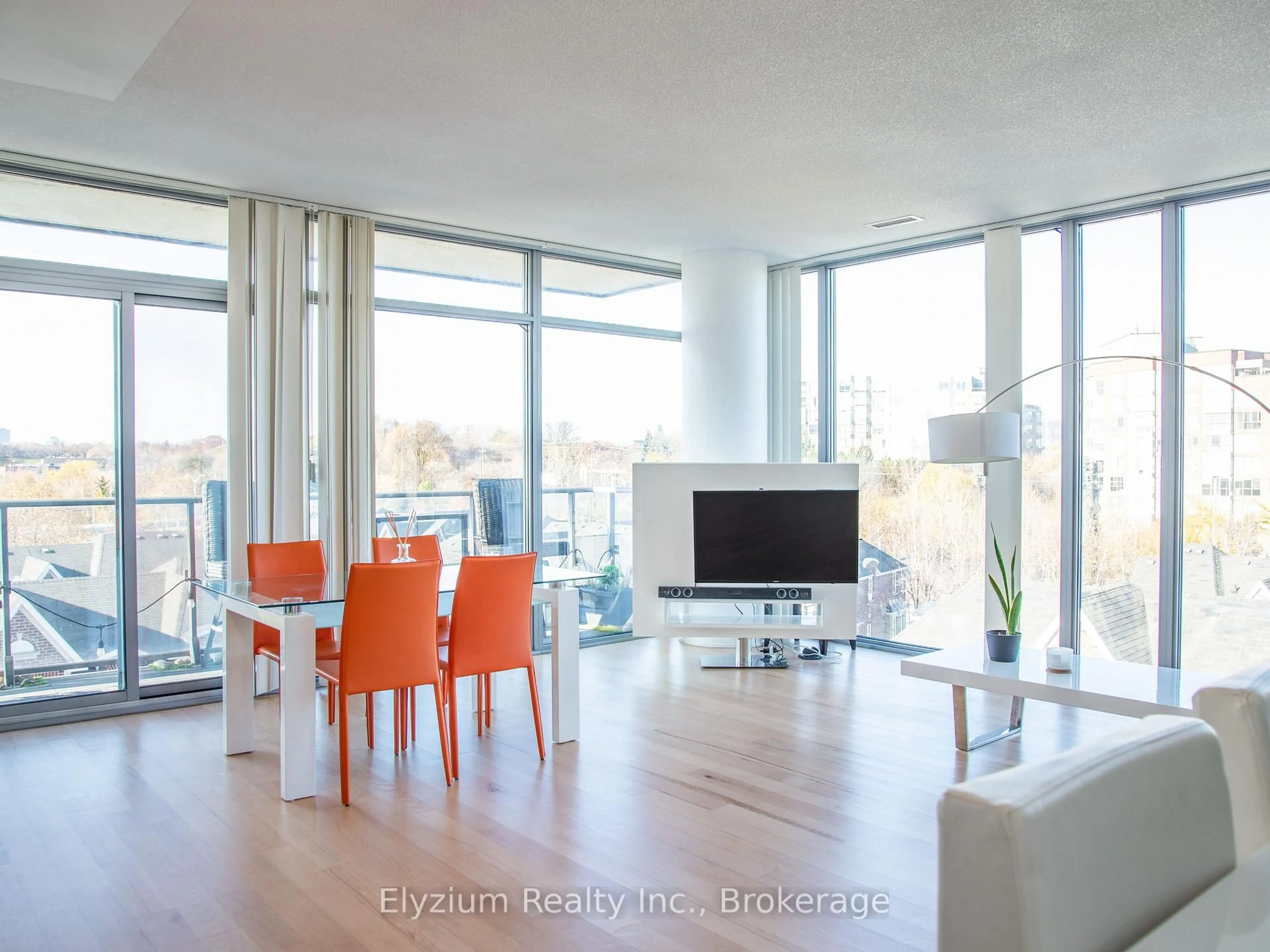 Living room with furniture, wood/laminate floor for 105 The Queensway Way #510, Toronto Ontario M6S 5B5