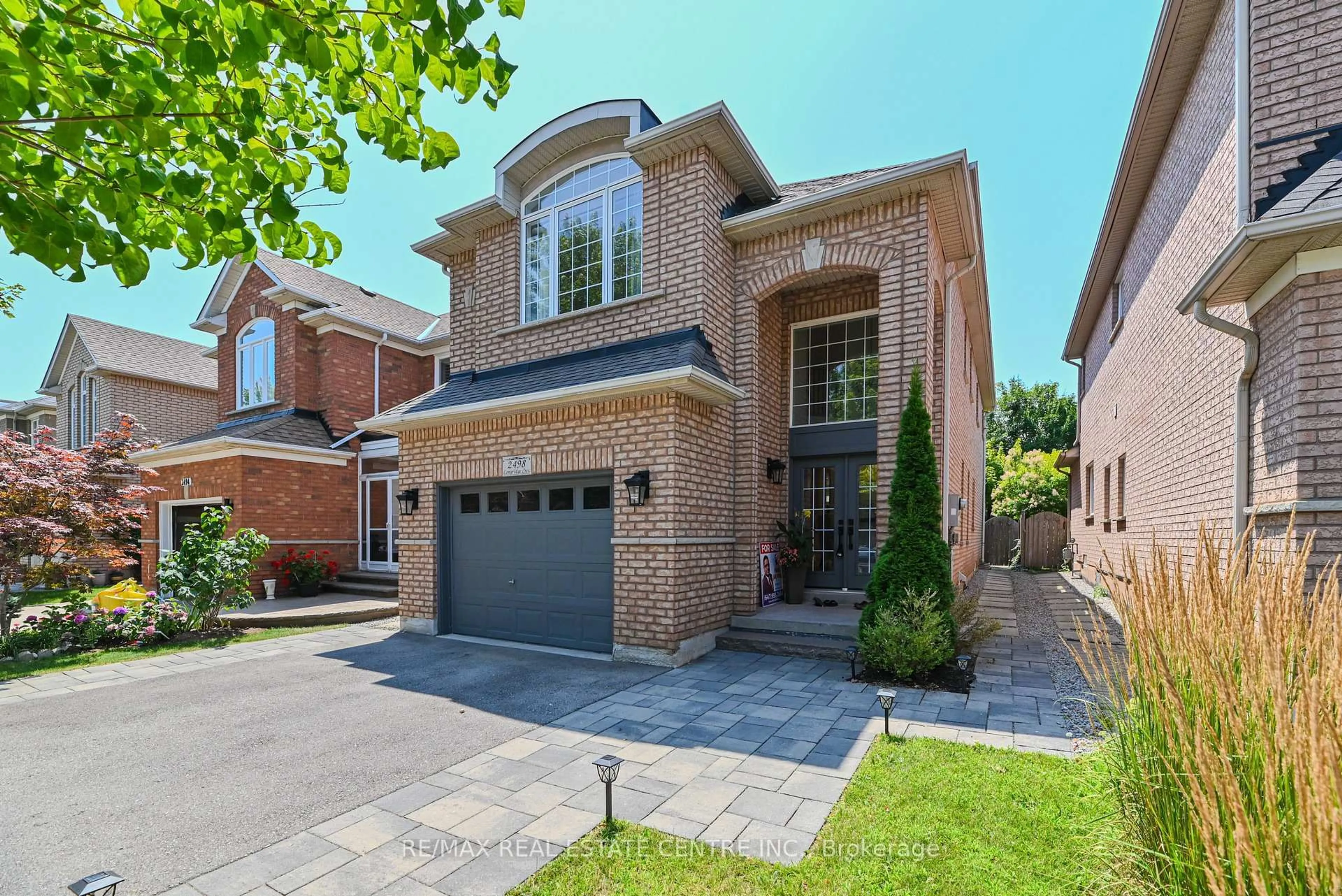 Home with brick exterior material, street for 2498 Longridge Cres, Oakville Ontario L6H 6S2