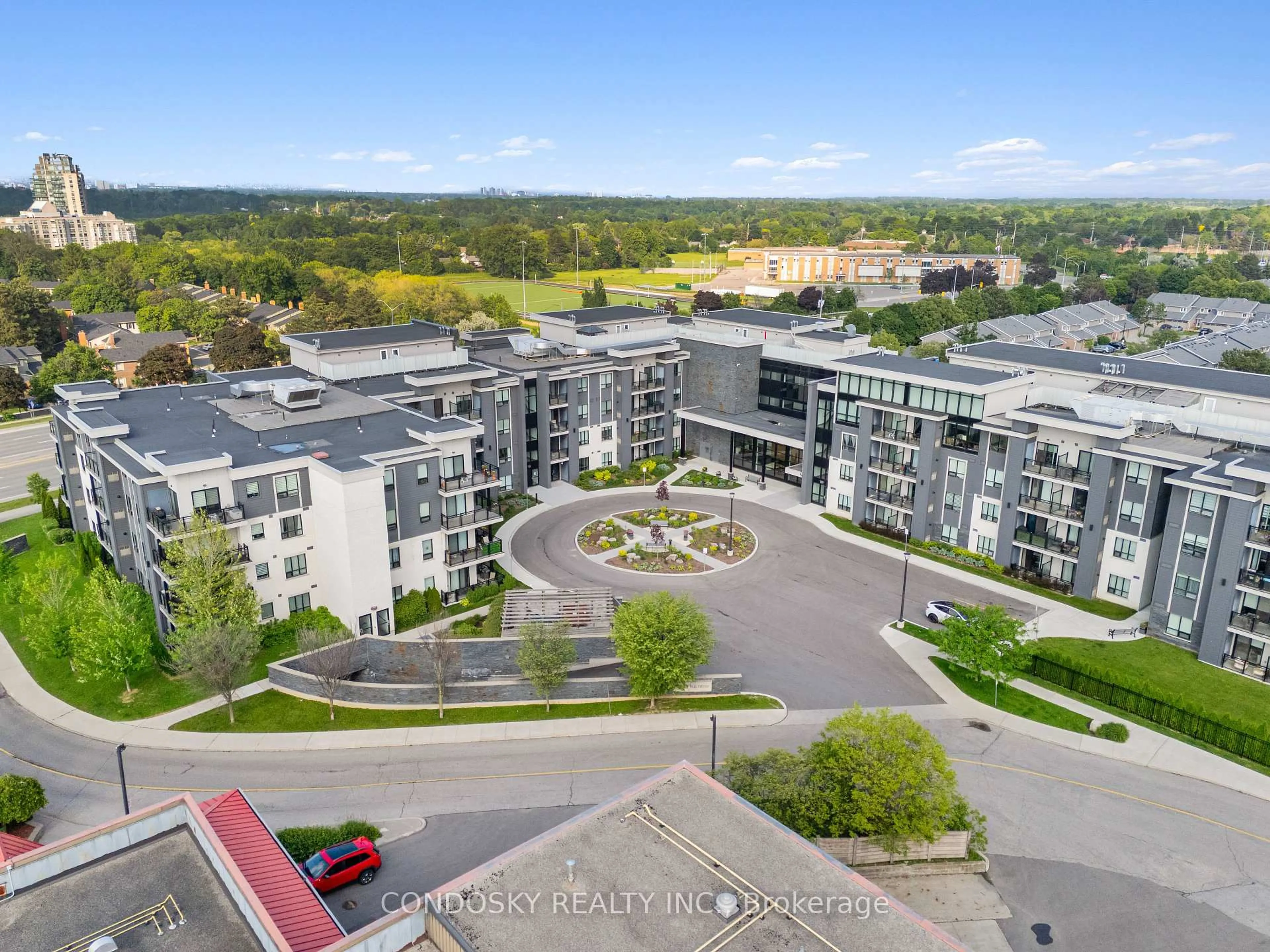 A pic from outside/outdoor area/front of a property/back of a property/a pic from drone, unknown for 3170 Erin Mills Pkwy #311, Mississauga Ontario L5L 0B6