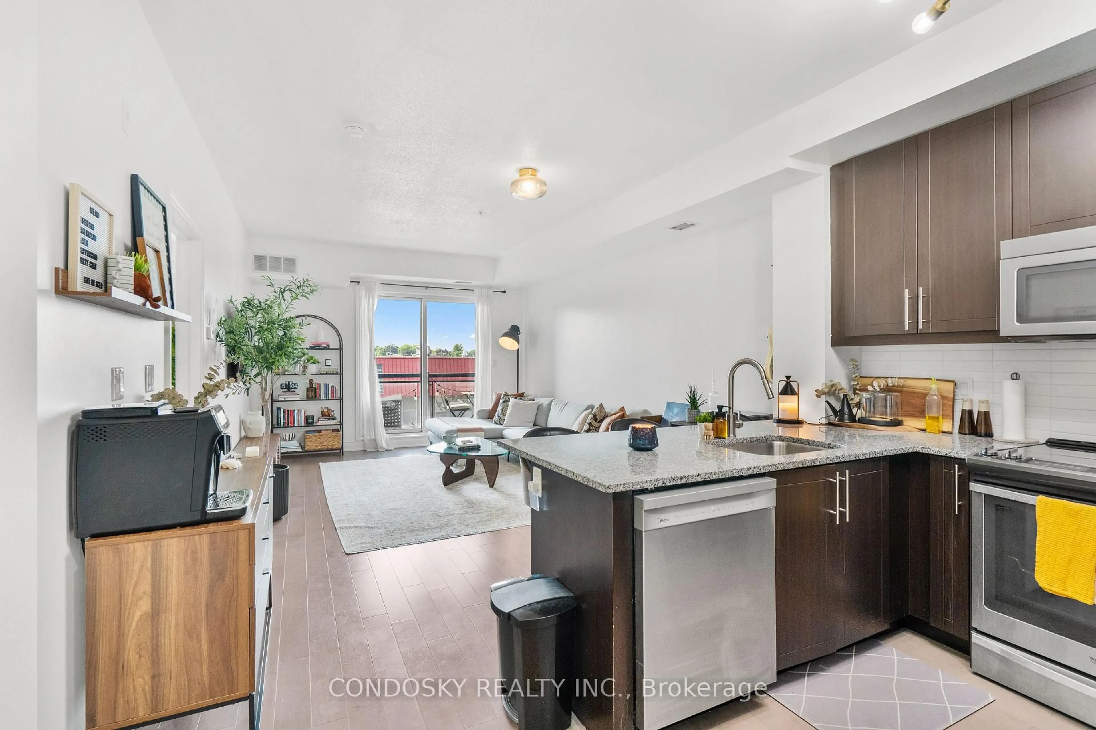 Open concept kitchen, unknown for 3170 Erin Mills Pkwy #311, Mississauga Ontario L5L 0B6