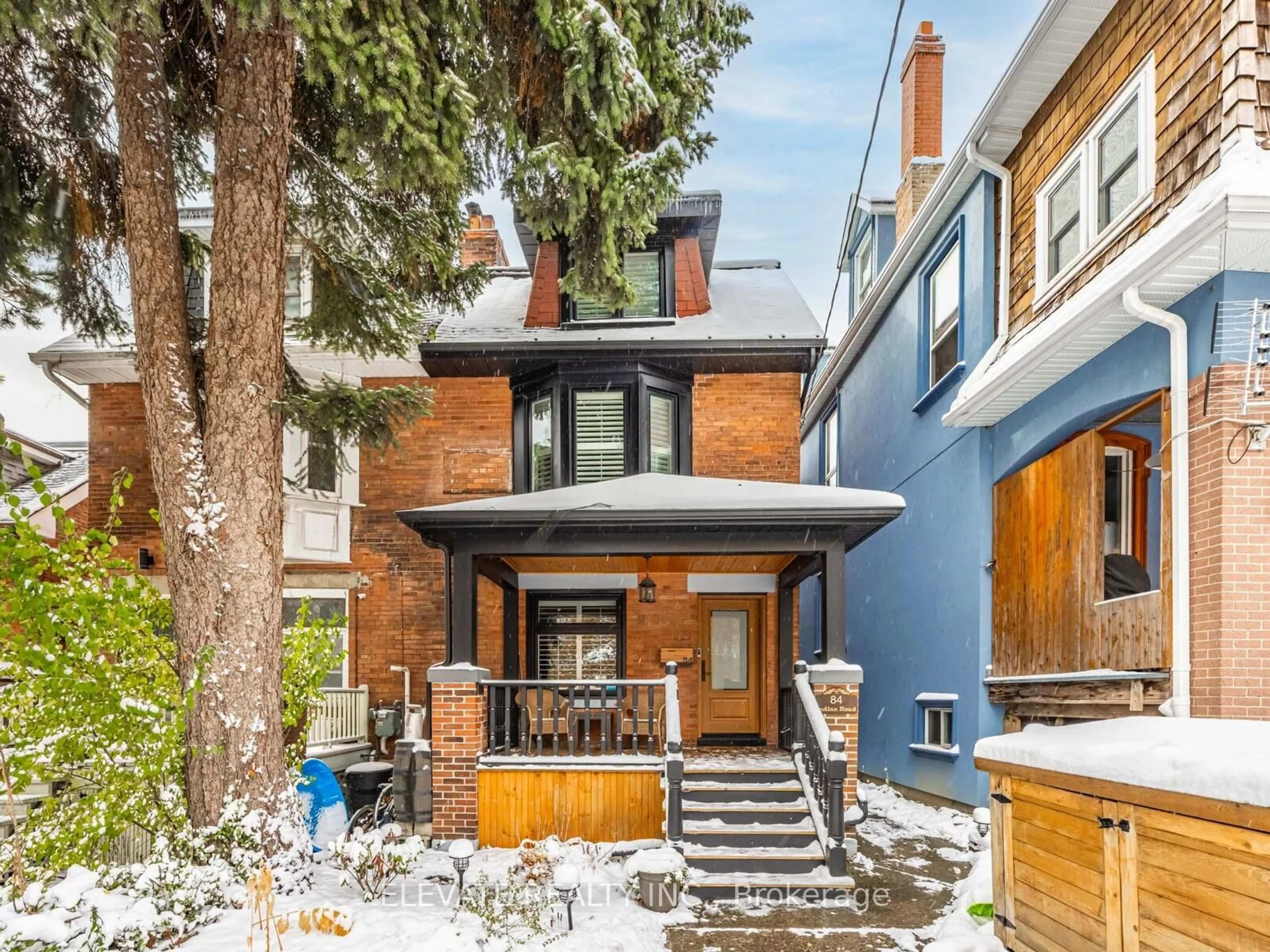 Home with brick exterior material, street for 84 Indian Rd, Toronto Ontario M6R 2V4