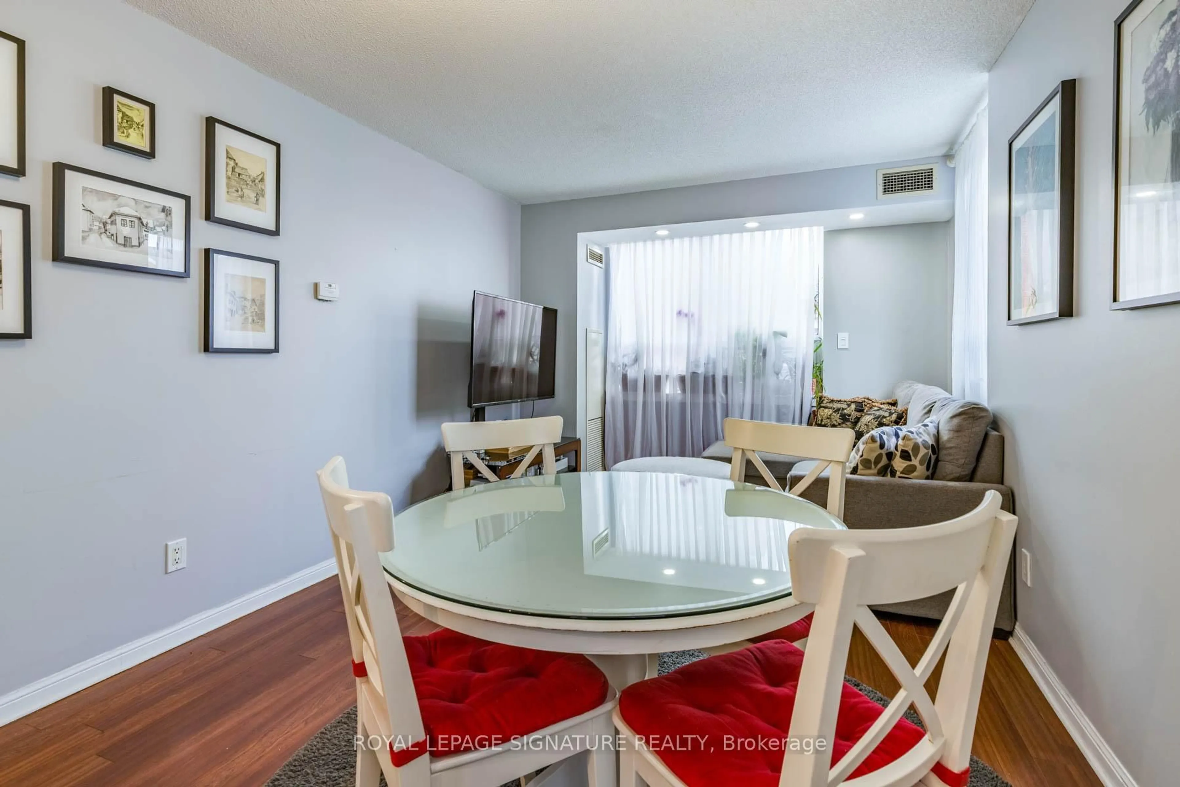 Dining room, wood/laminate floor for 4 Elsinore Path #203, Toronto Ontario M8V 4G7